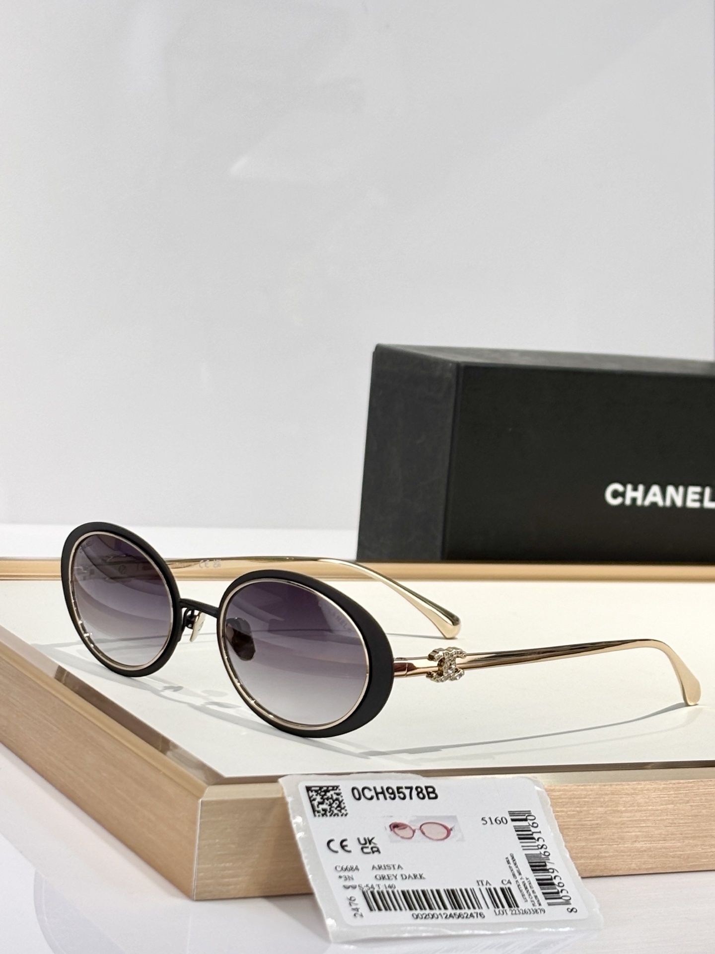 Chanel 0CH9578B Oval Sunglasses – Black & Gold with Crystal CC Logo
