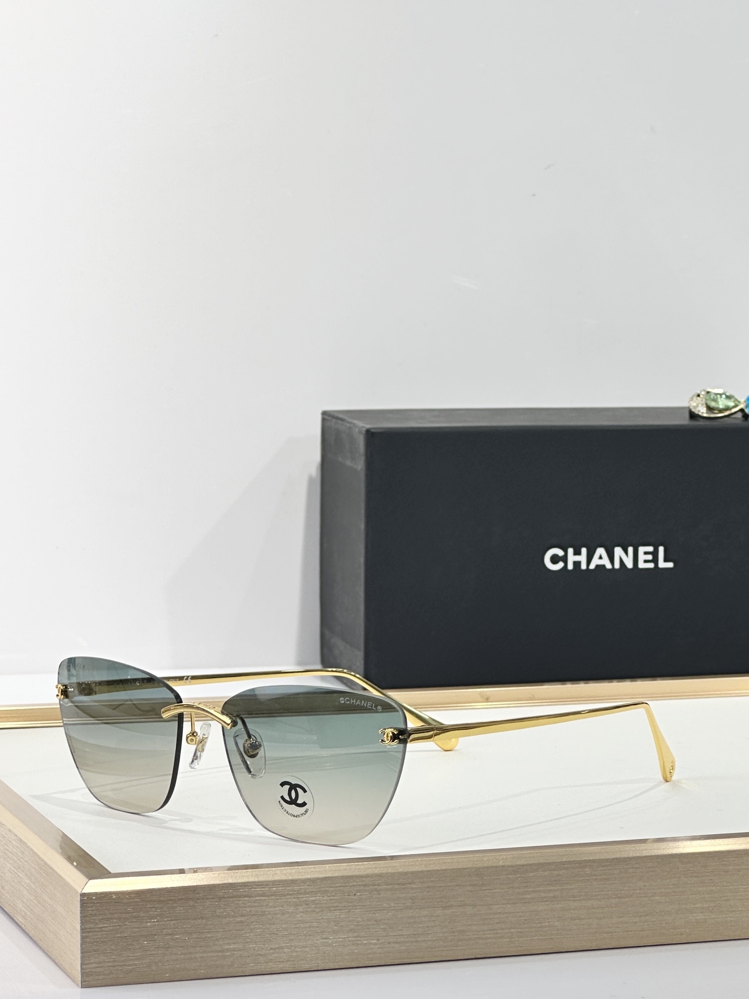 Chanel Butterfly Rimless Sunglasses – Elegant Gradient Lenses