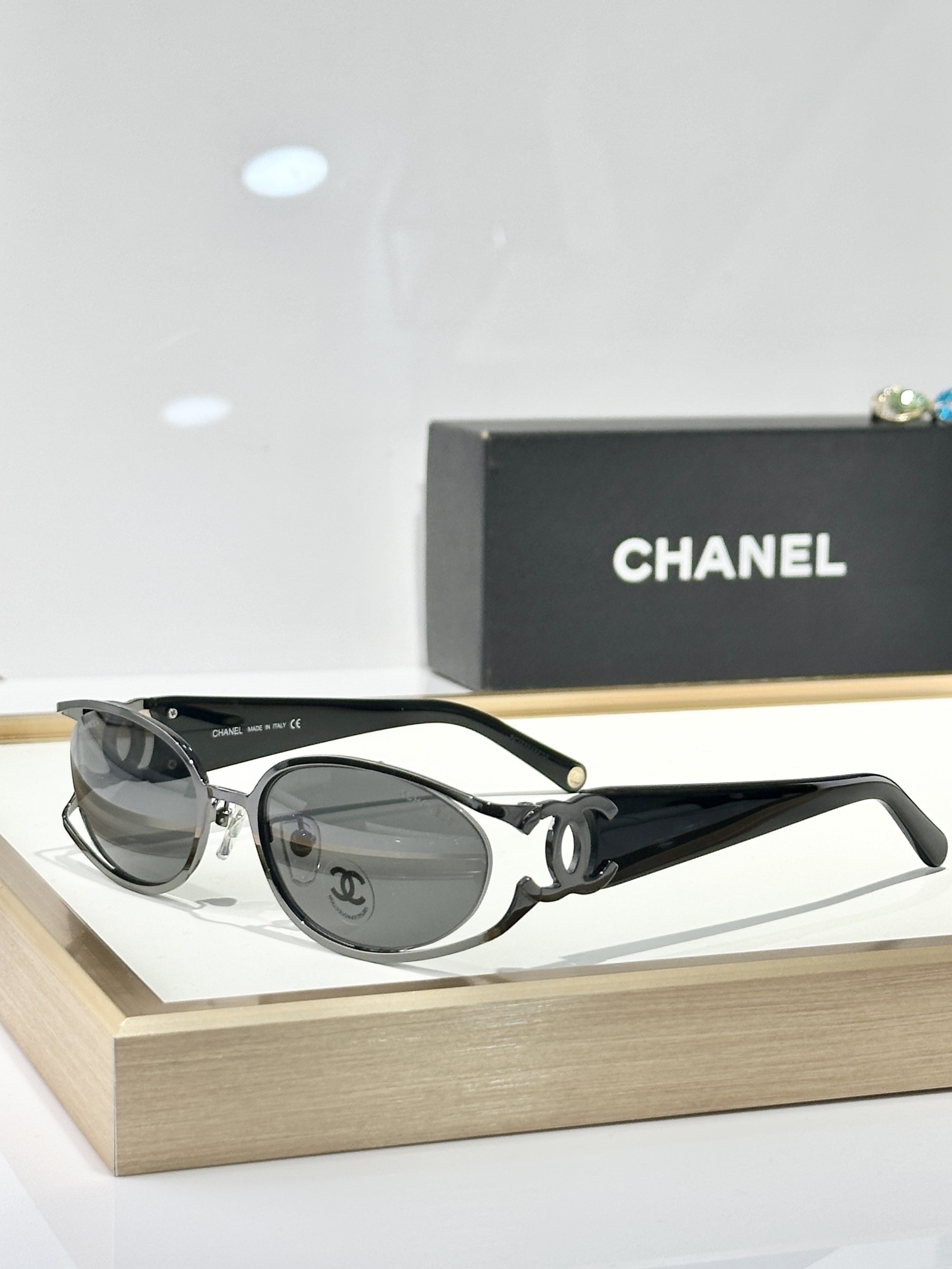 Chanel Luxury Oval Sunglasses with Signature Gold CC Logo