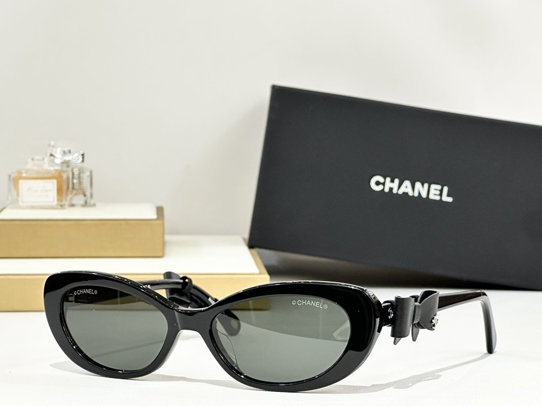 Chanel Cat-Eye Sunglasses with Leather Bow Detail & CC Logo