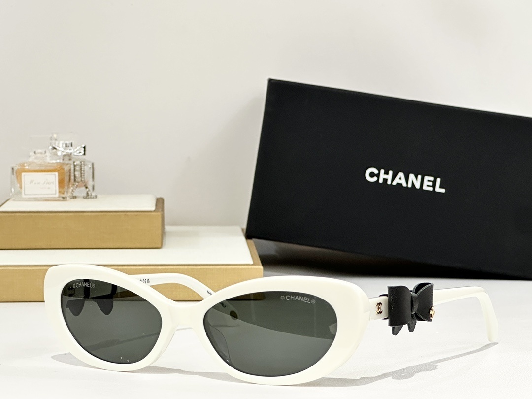 Chanel Cat-Eye Sunglasses with Leather Bow Detail & CC Logo