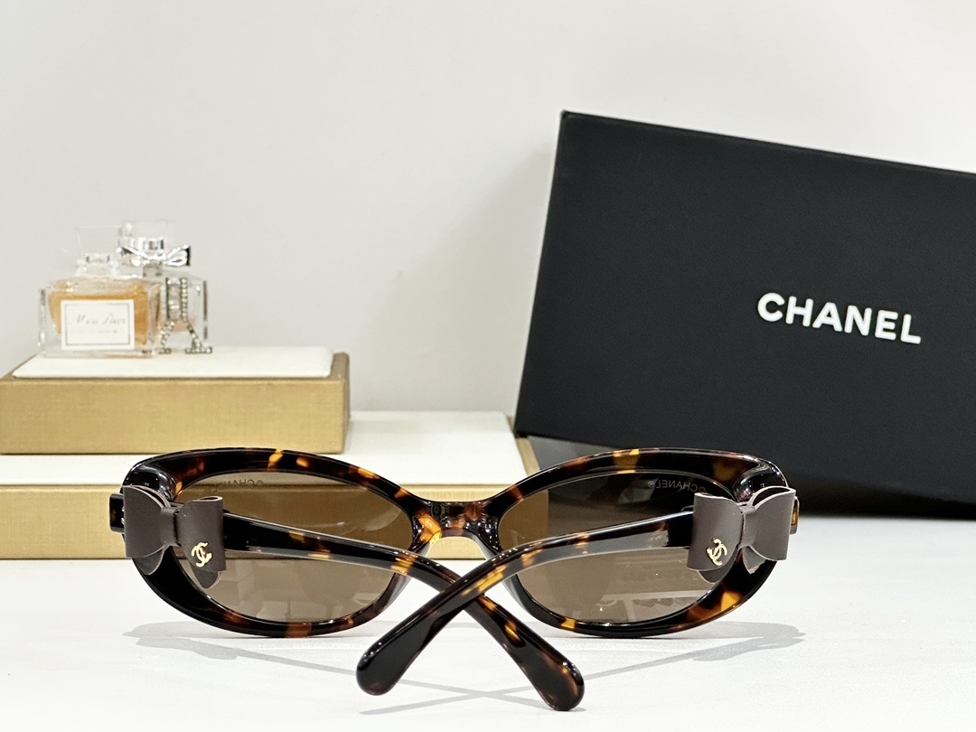 Chanel Cat-Eye Sunglasses with Leather Bow Detail & CC Logo