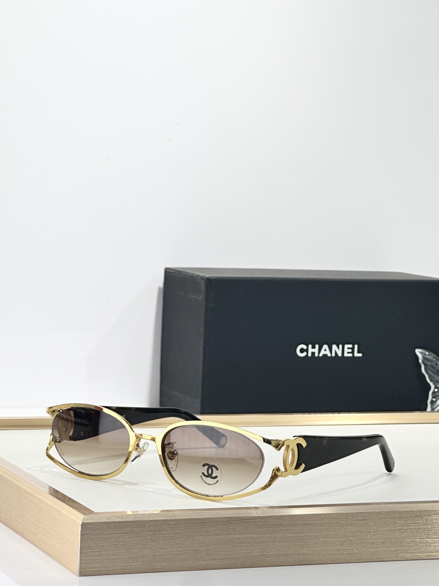 Chanel Vintage Oval Gold Frame Sunglasses with Iconic CC Logo