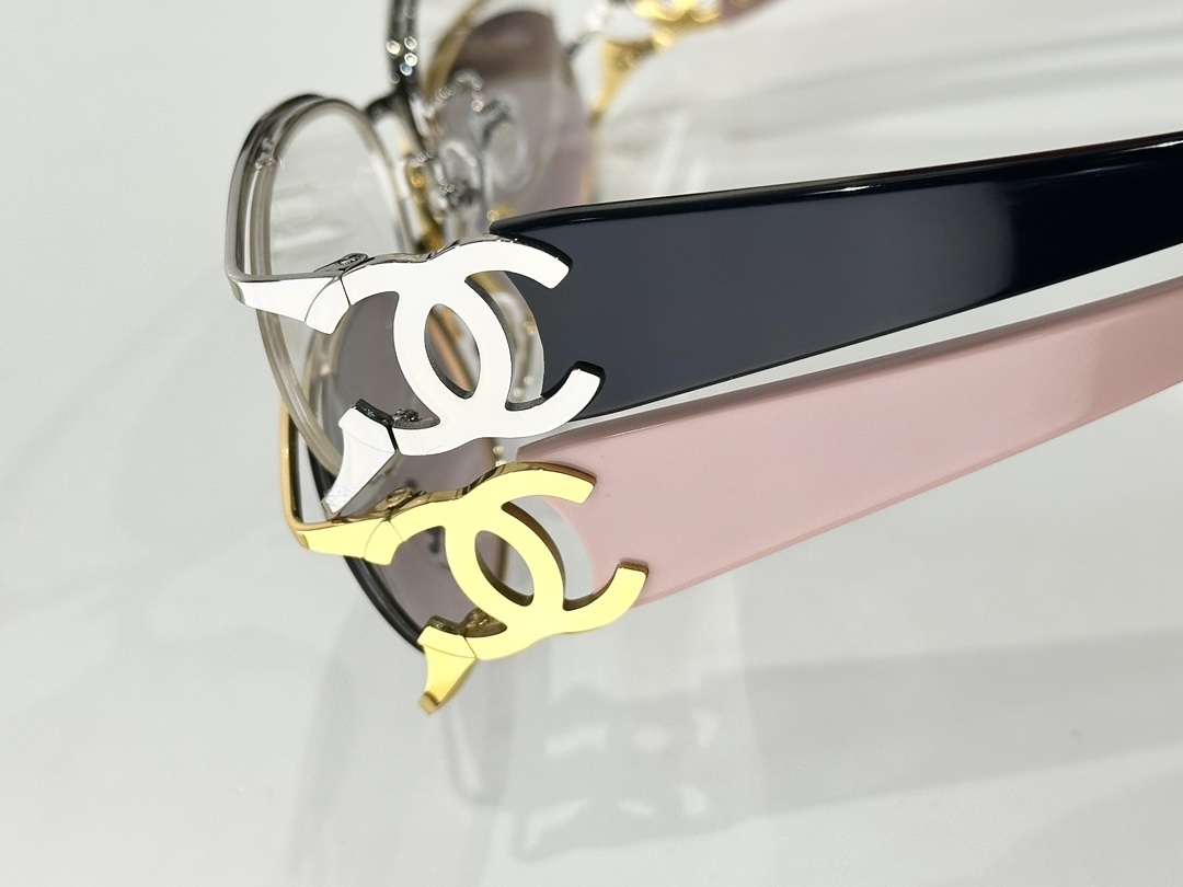 Chanel Vintage Oval Gold Frame Sunglasses with Iconic CC Logo