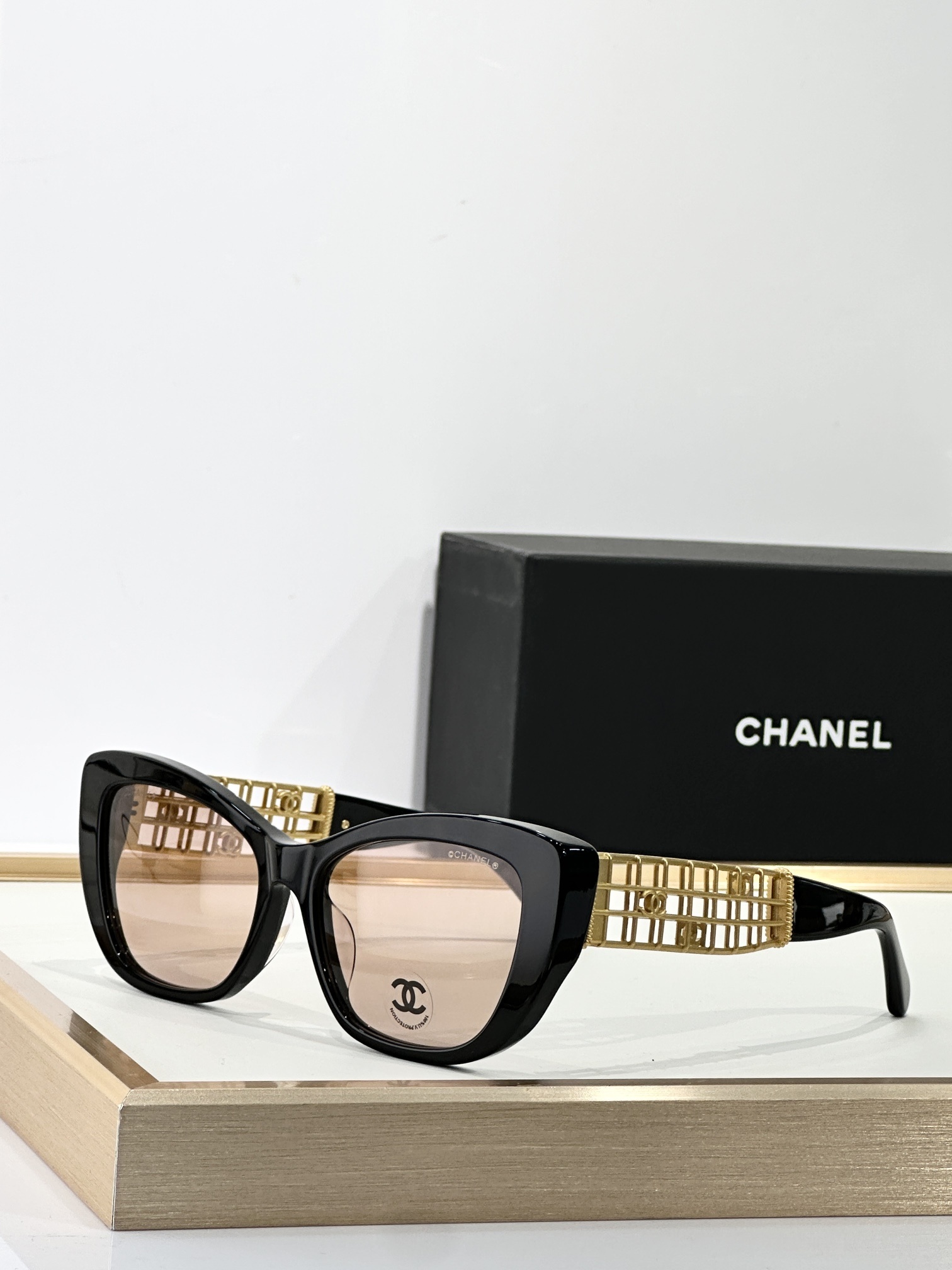 Chanel Luxury Cat-Eye Sunglasses with Gold Cage CC Logo Temples