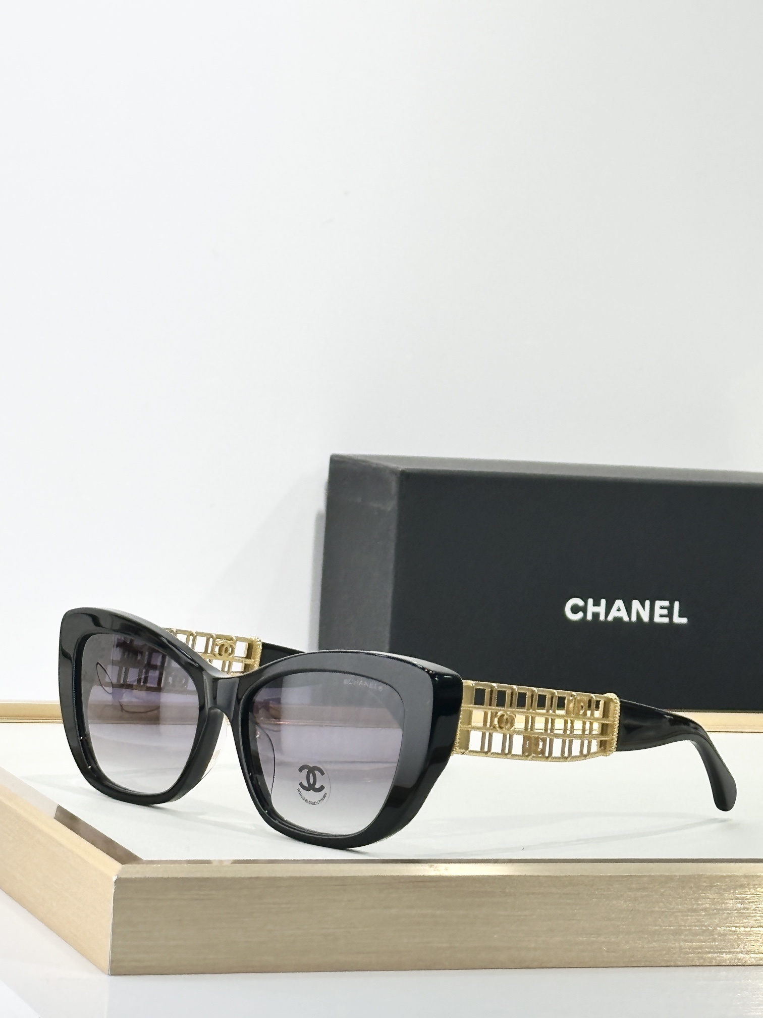 Chanel Luxury Cat-Eye Sunglasses with Gold Cage CC Logo Temples
