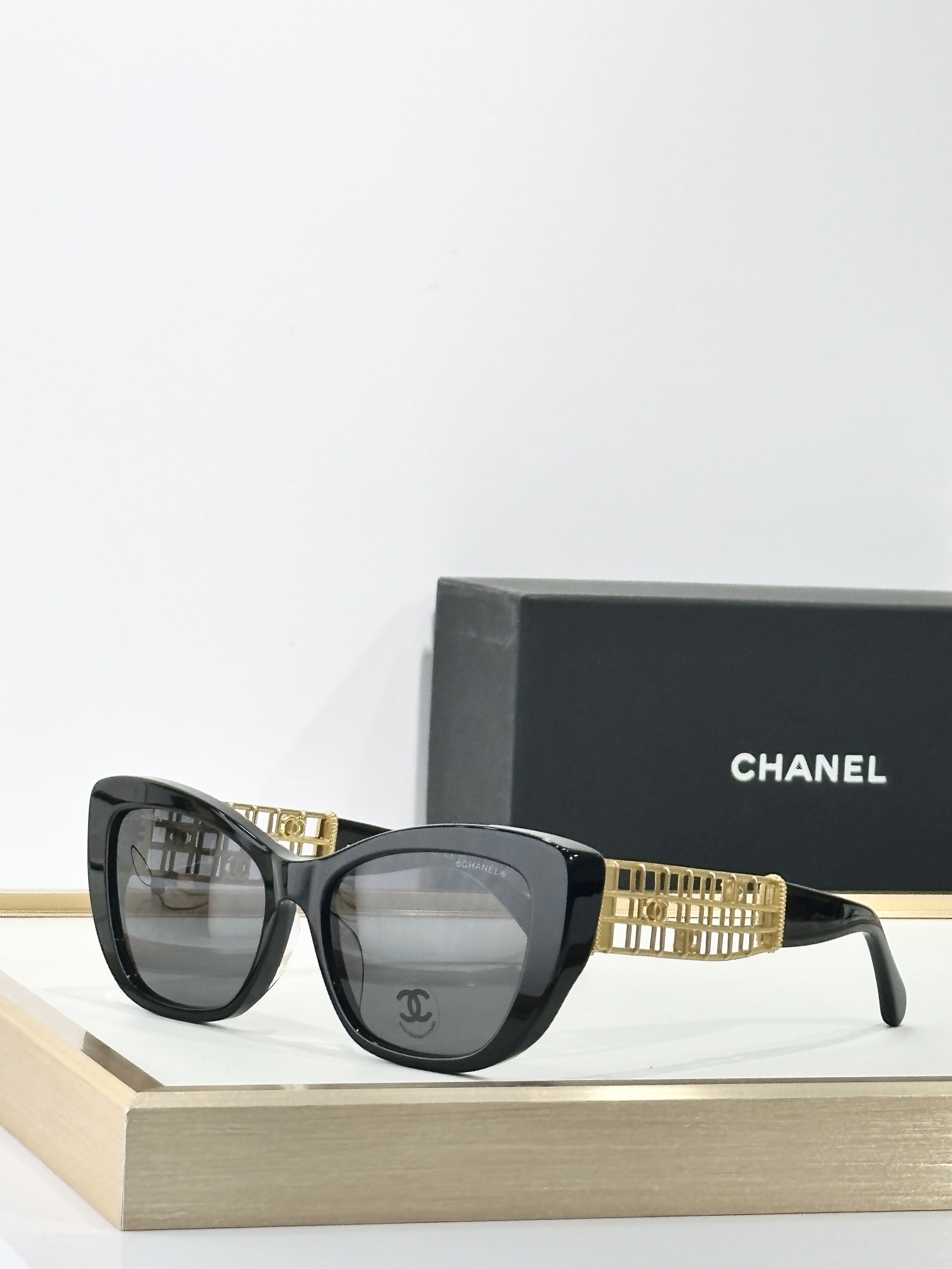 Chanel Luxury Cat-Eye Sunglasses with Gold Cage CC Logo Temples