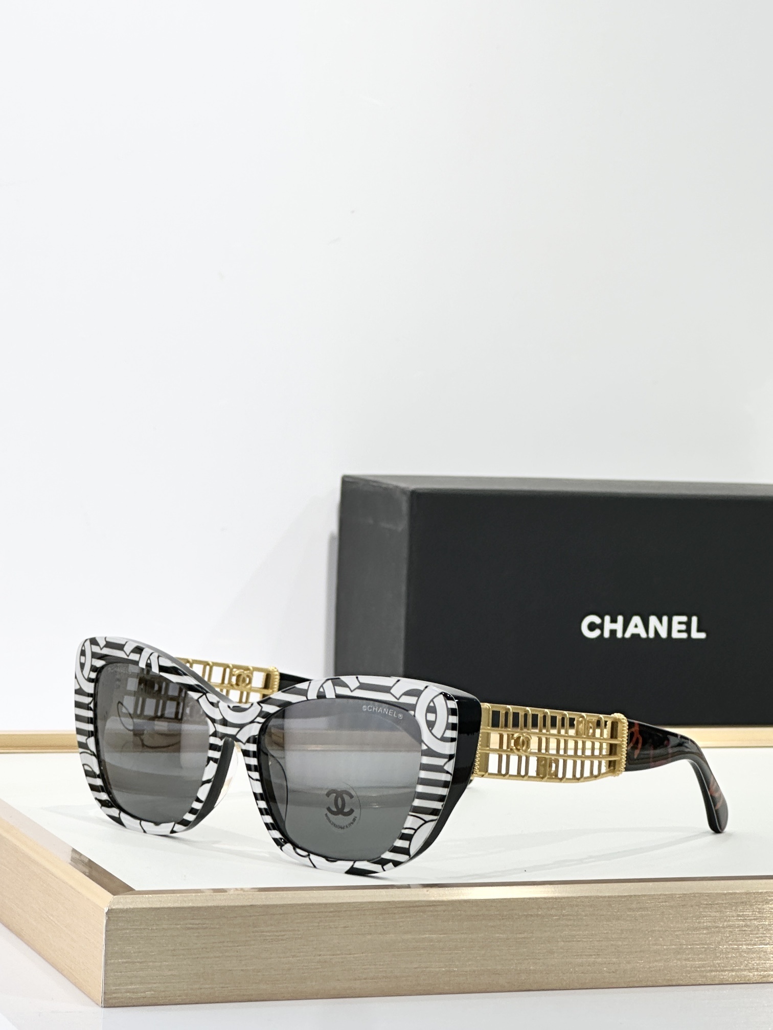 Chanel Luxury Cat-Eye Sunglasses with Gold Cage CC Logo Temples
