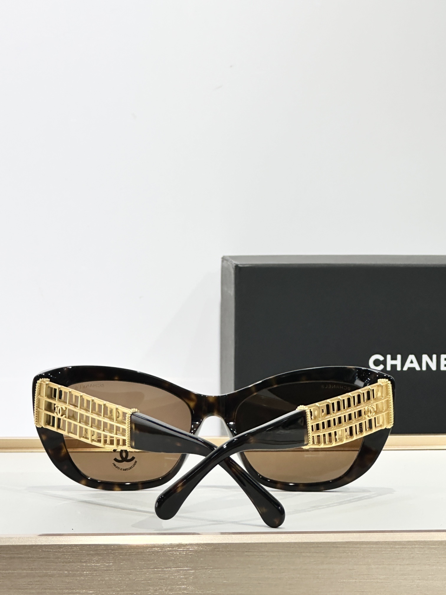Chanel Luxury Cat-Eye Sunglasses with Gold Cage CC Logo Temples
