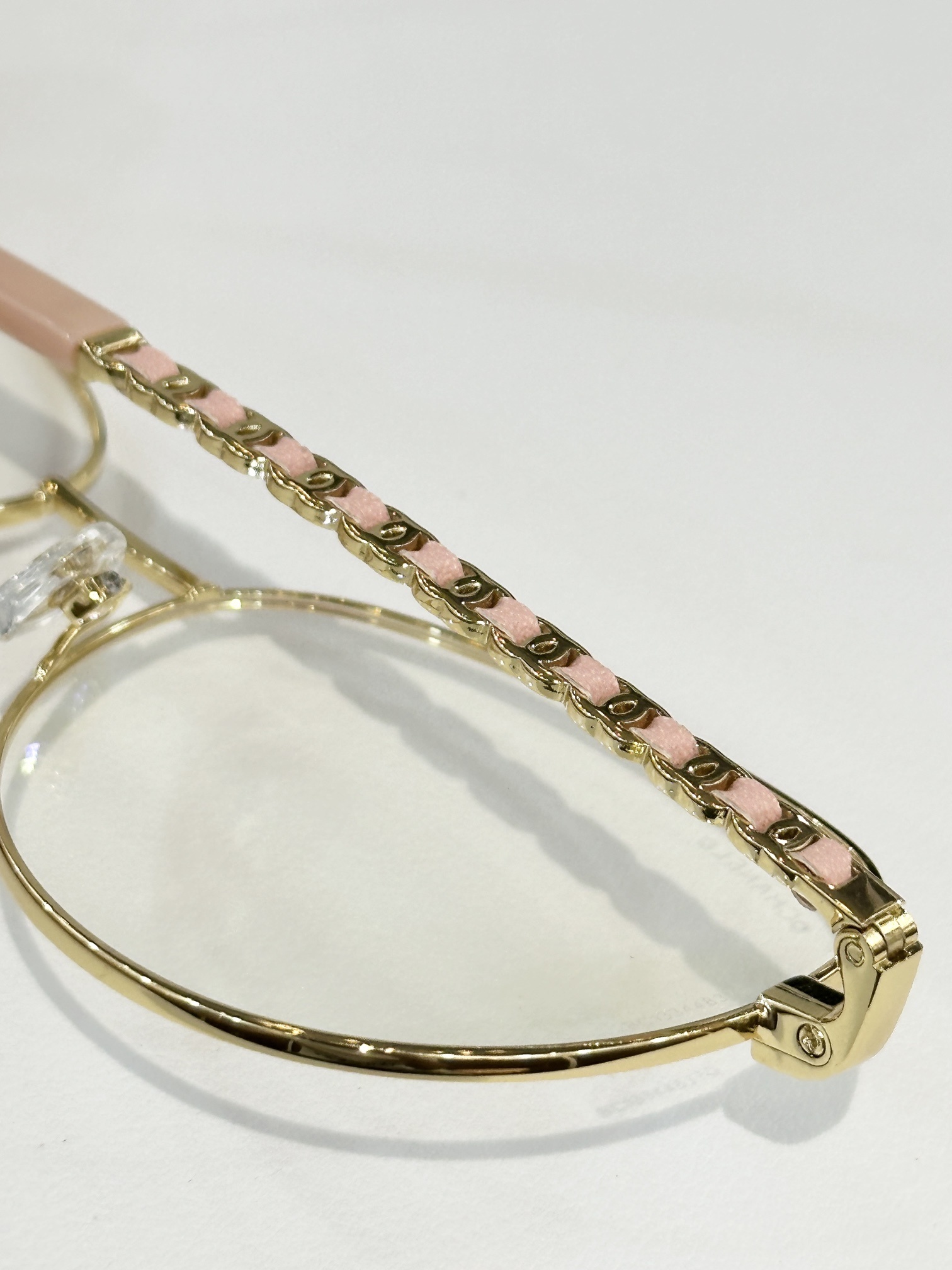 Chanel Women’s Gold Round Eyeglasses with Pink Leather Chain
