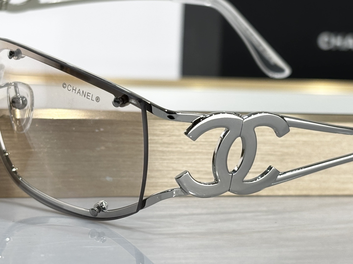 Chanel Silver Y2K Shield Sunglasses – Futuristic Rimless Eyewear