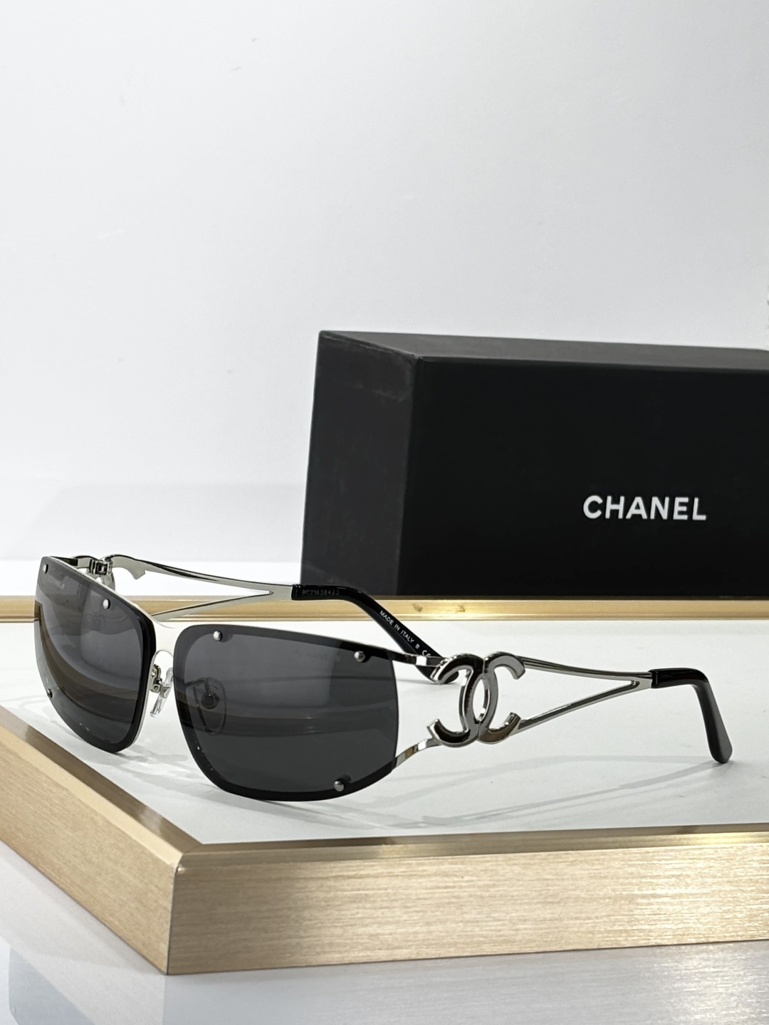 Chanel Luxury Rimless Sunglasses – Elegant CC Logo Metal Frame