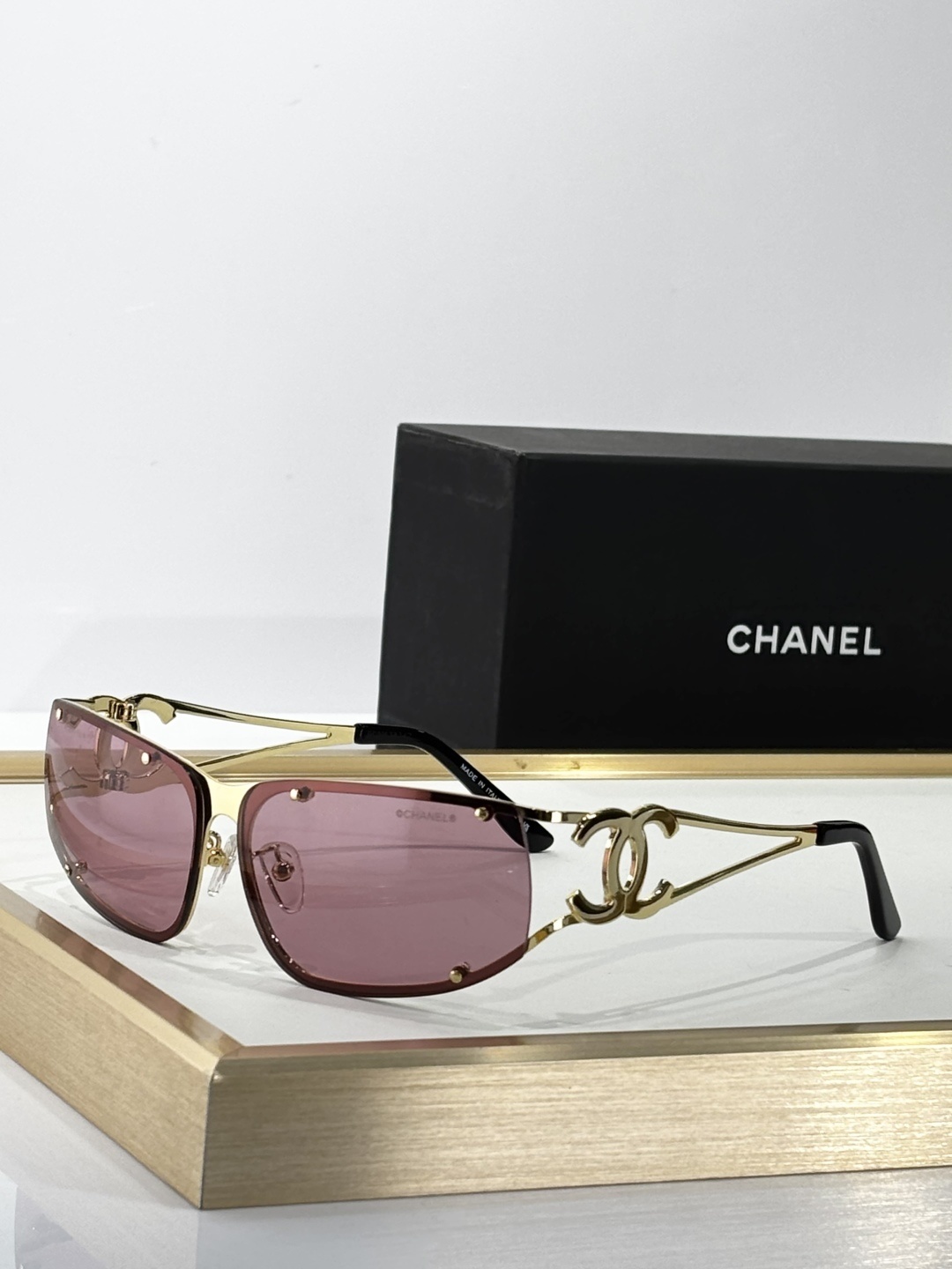 Chanel Luxury Rimless Sunglasses – Elegant CC Logo Metal Frame