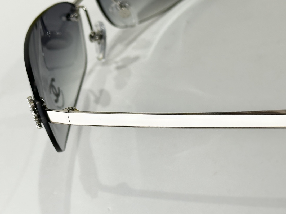 Chanel Rimless Oval Sunglasses – Gold & Crystal CC Logo