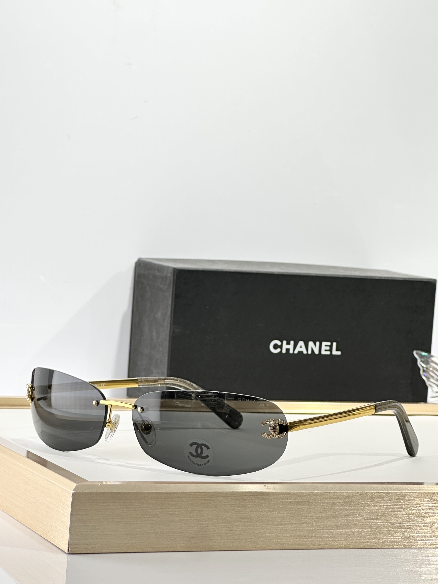Chanel Rimless Oval Sunglasses with Rhinestone CC Logo – Y2K Style
