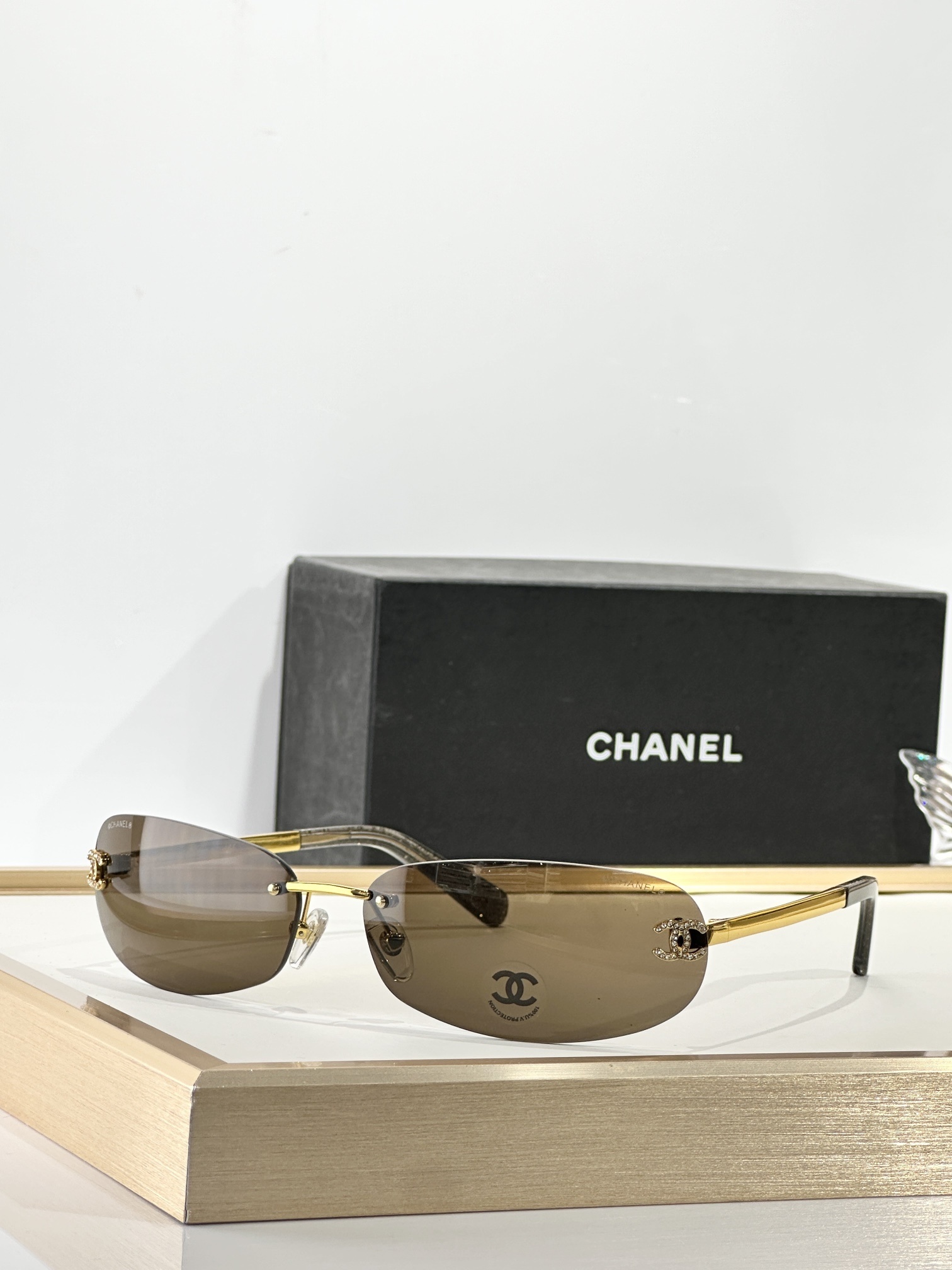 Chanel Rimless Oval Sunglasses with Rhinestone CC Logo – Y2K Style