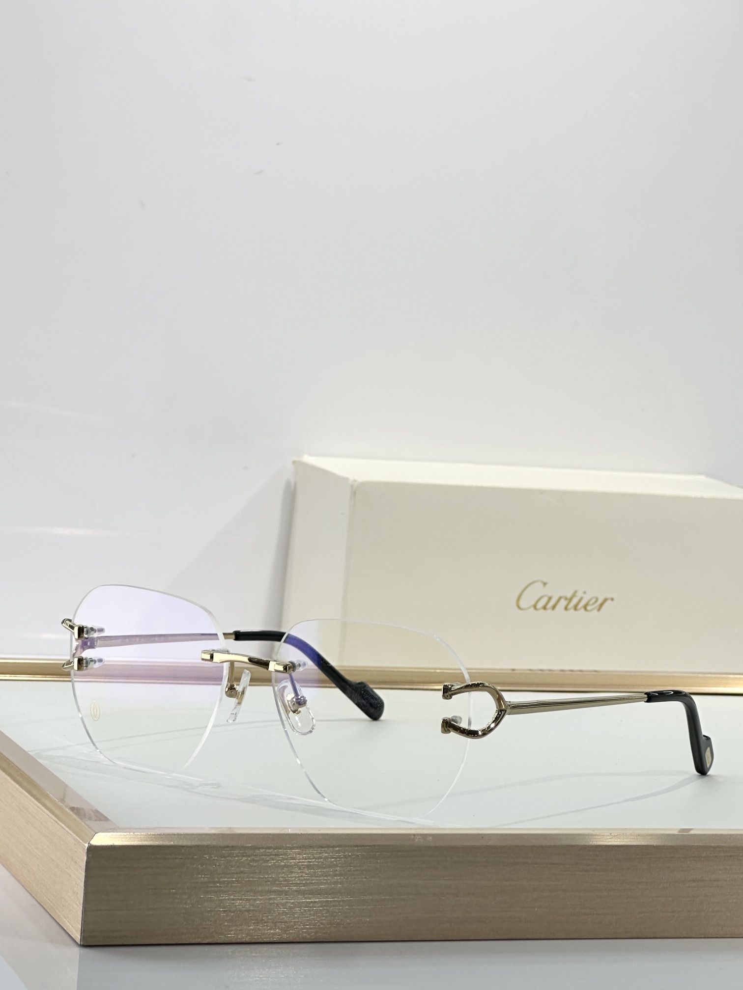 Luxury Cartier Rimless Eyeglasses – Elegant C Décor Gold Frames