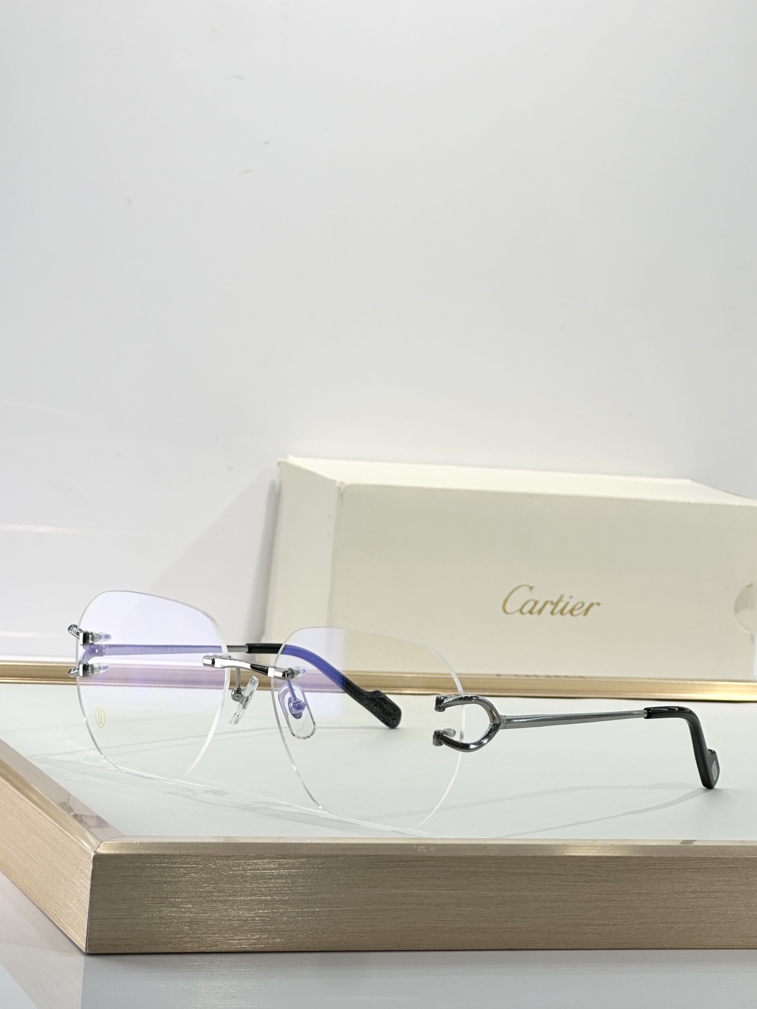 Luxury Cartier Rimless Eyeglasses – Elegant C Décor Gold Frames