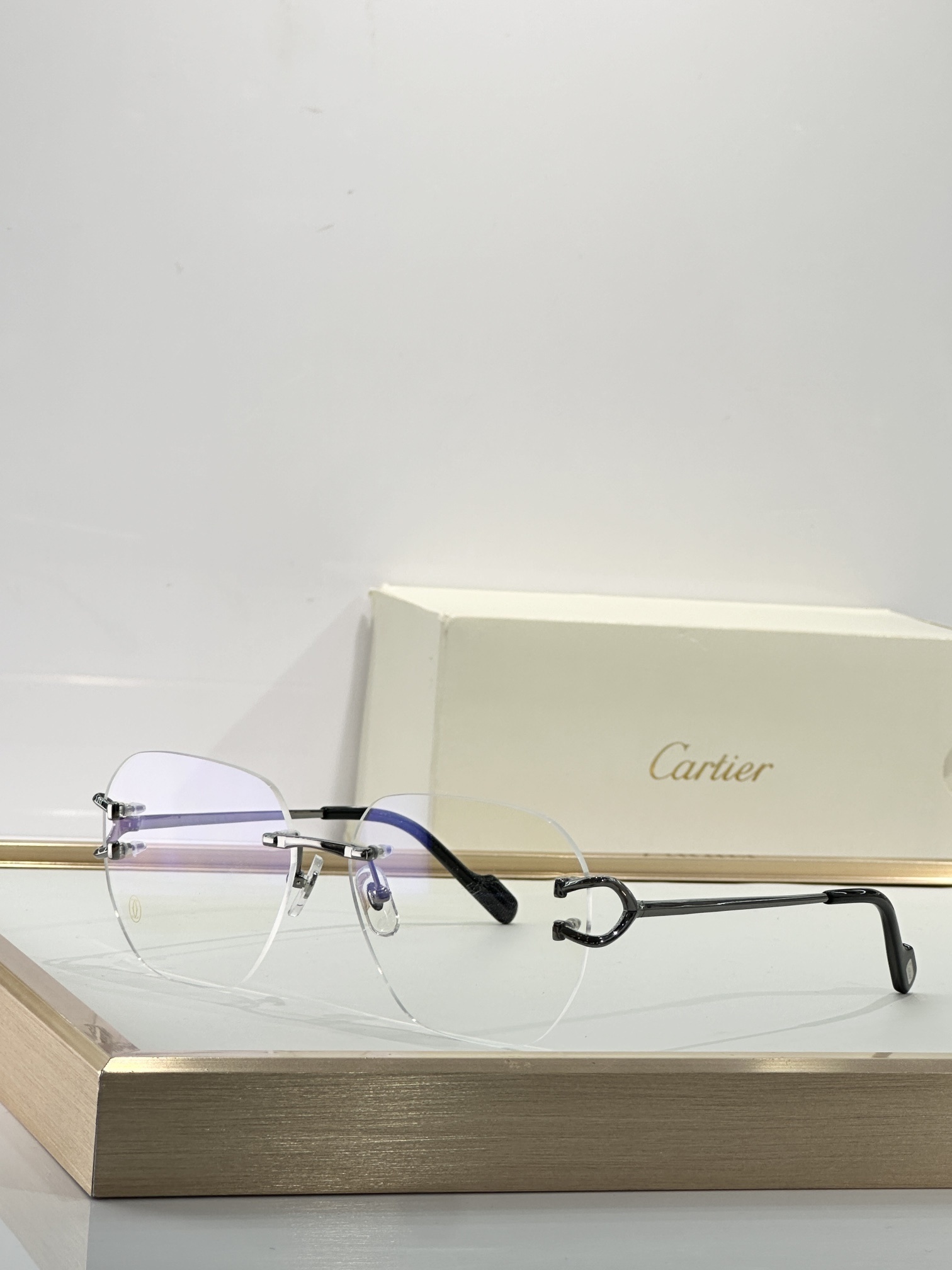 Luxury Cartier Rimless Eyeglasses – Elegant C Décor Gold Frames