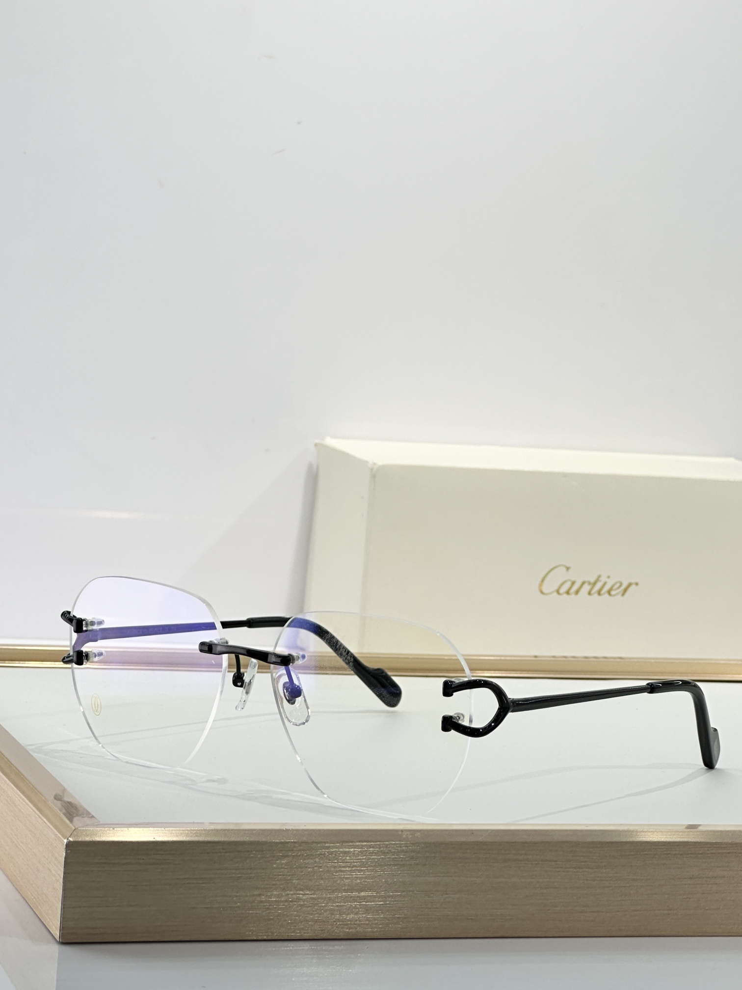 Luxury Cartier Rimless Eyeglasses – Elegant C Décor Gold Frames