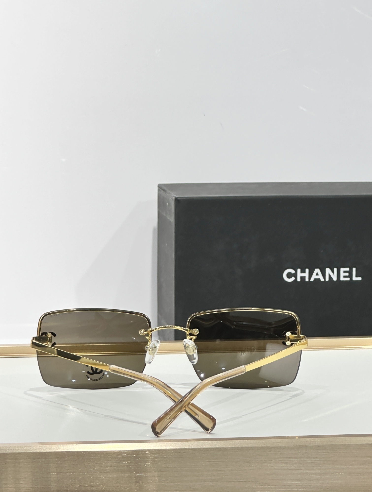 Chanel CH4104-B Rimless Rectangular Sunglasses with Crystal CC Logo