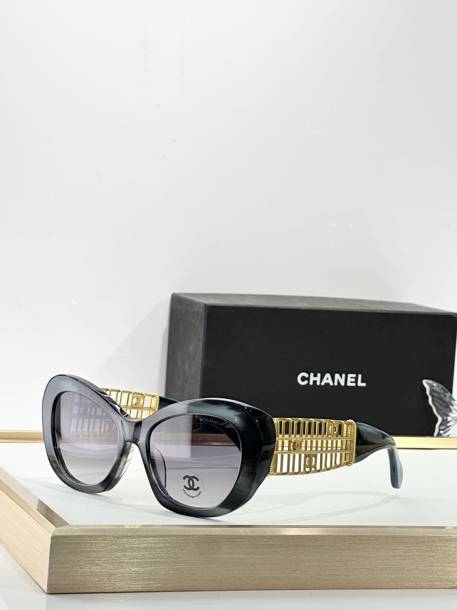 Chanel Luxury Cat-Eye Sunglasses with Gold Filigree CC Logo