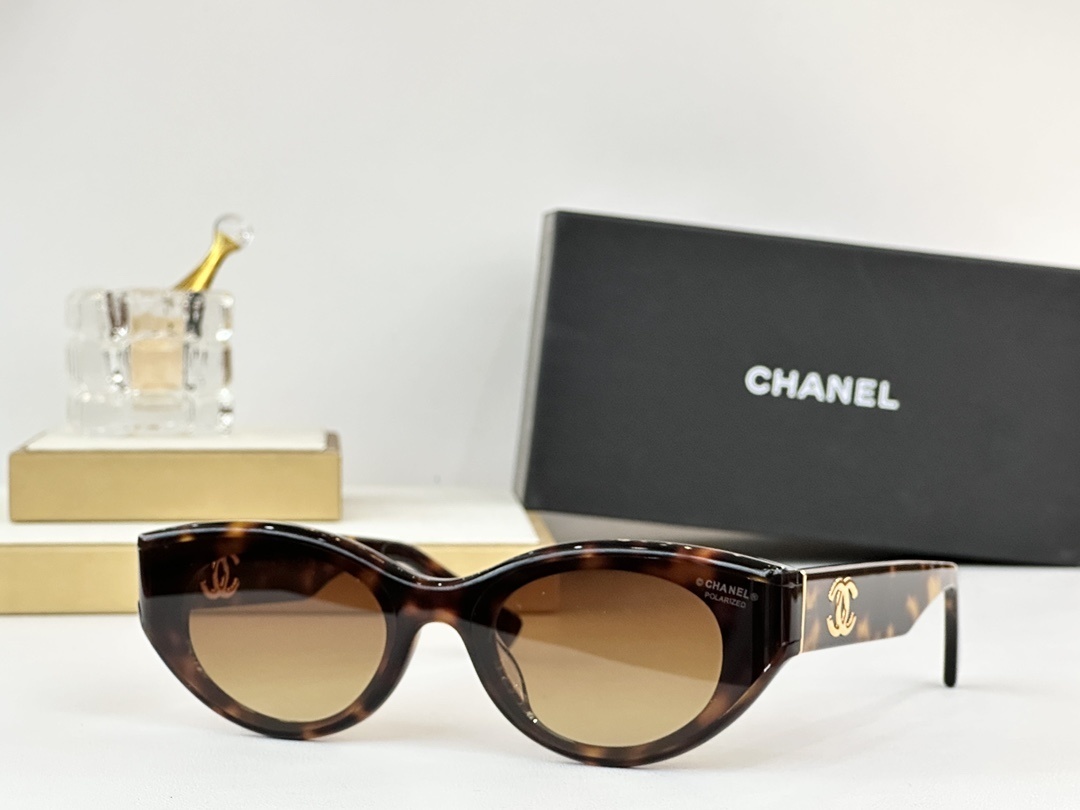 Chanel Women’s Polarized Cat-Eye Sunglasses with Iconic CC Logo