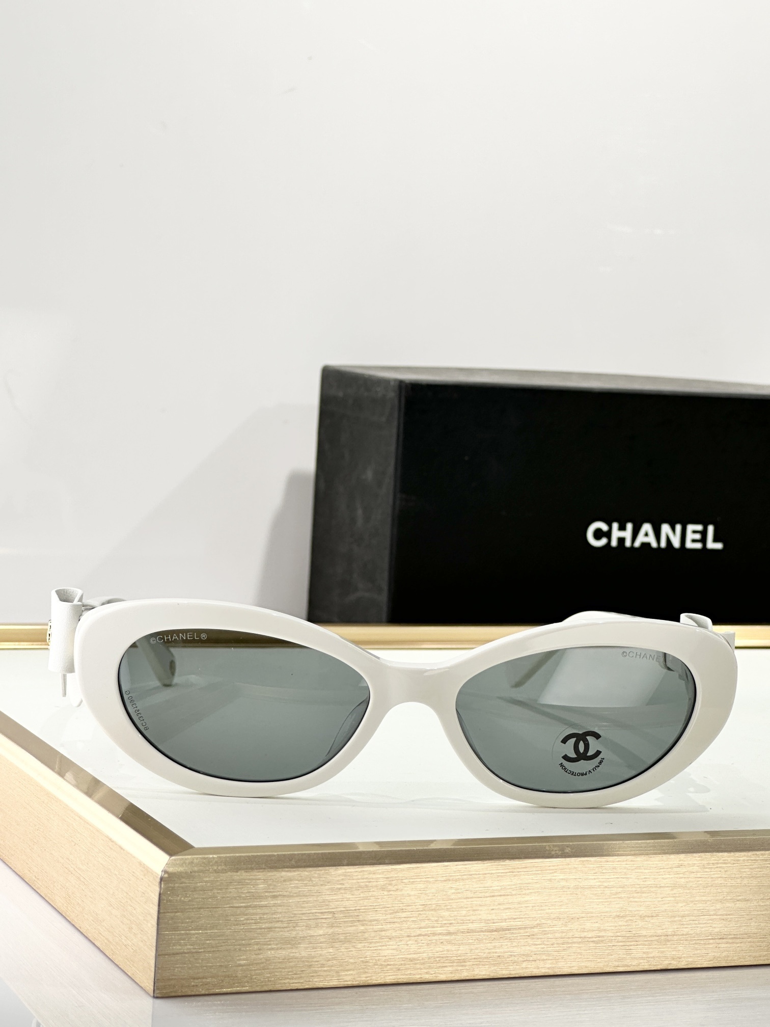 Chanel White Oval Sunglasses with Bow Detail & Gold CC Logo
