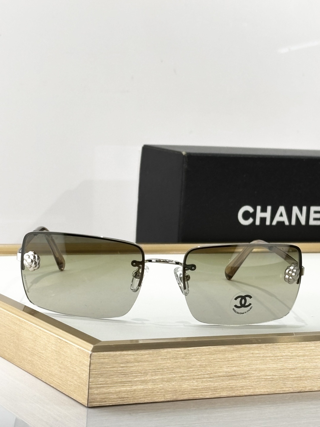 Chanel Camellia Rimless Rectangular Sunglasses – Designer Luxury