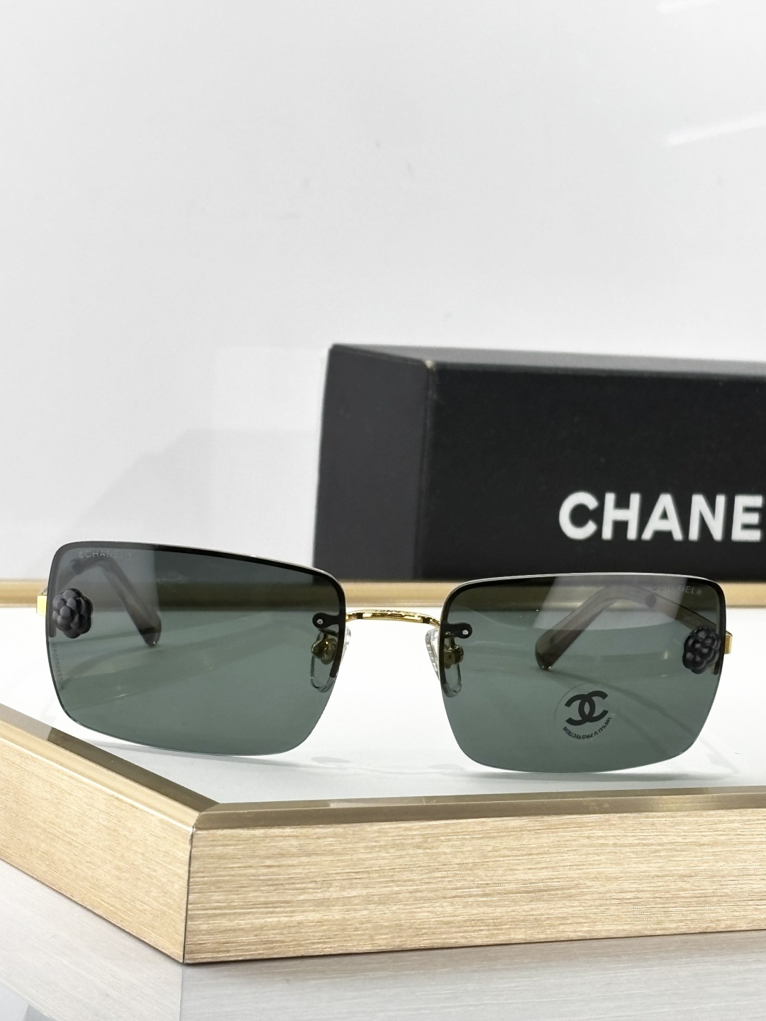 Chanel Camellia Rimless Rectangular Sunglasses – Designer Luxury