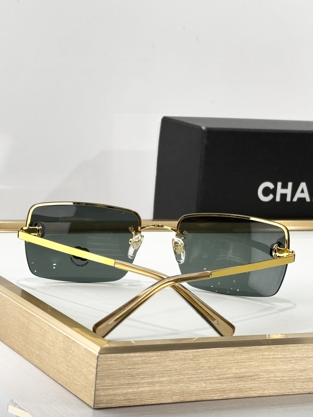 Chanel Camellia Rimless Rectangular Sunglasses – Designer Luxury