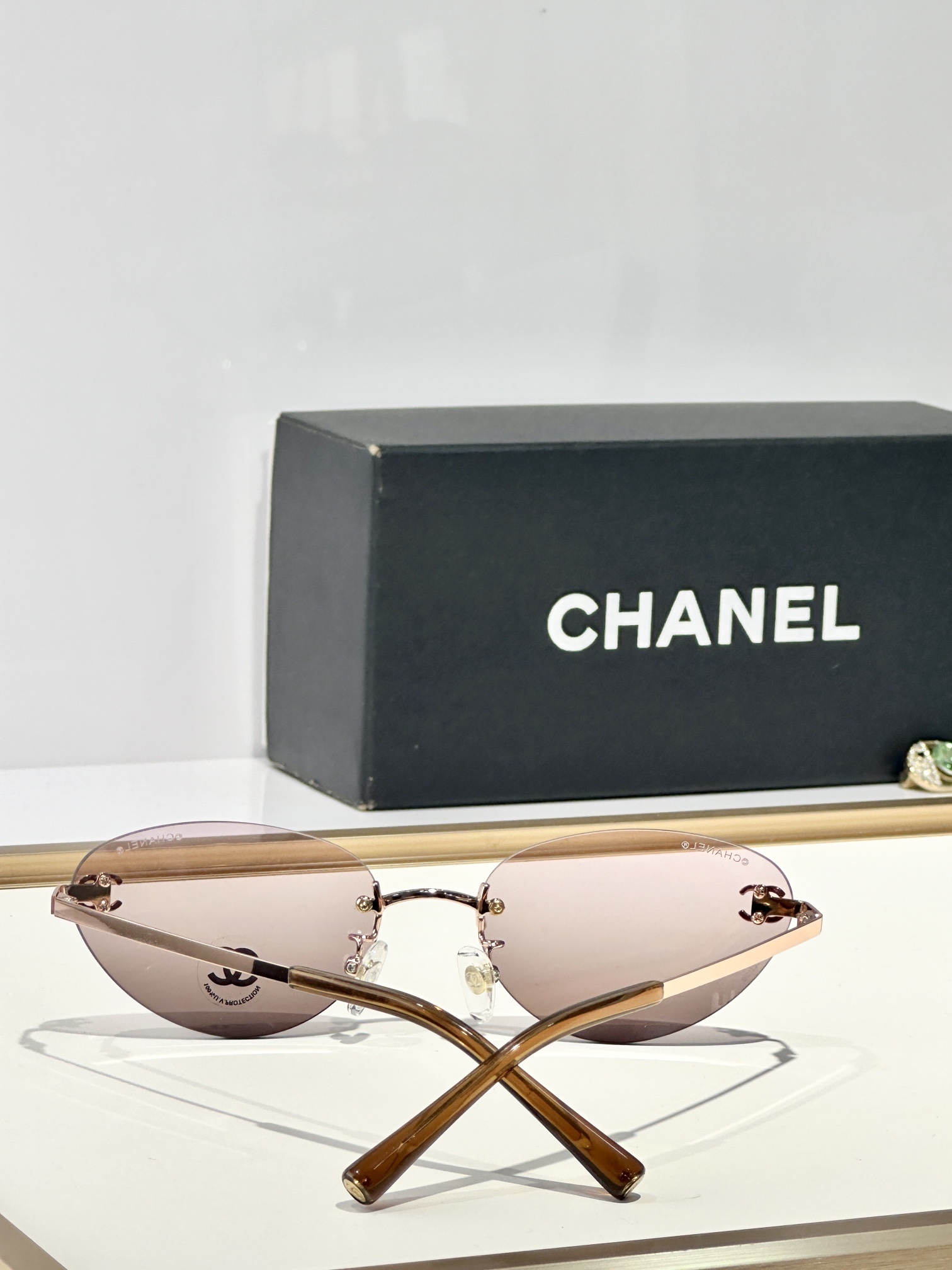 pink Chanel Rimless Oval Sunglasses – Chanel Rimless Oval Sunglasses