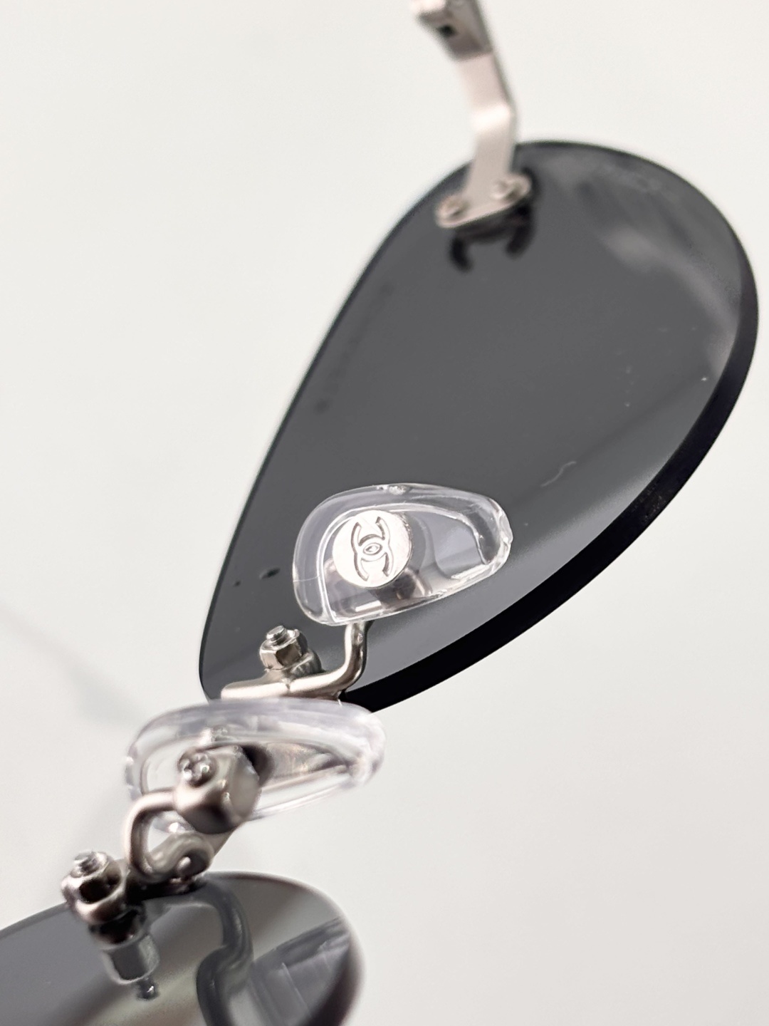 Chanel Luxury Rimless Sunglasses – Blue Tinted Lenses & Silver Logo