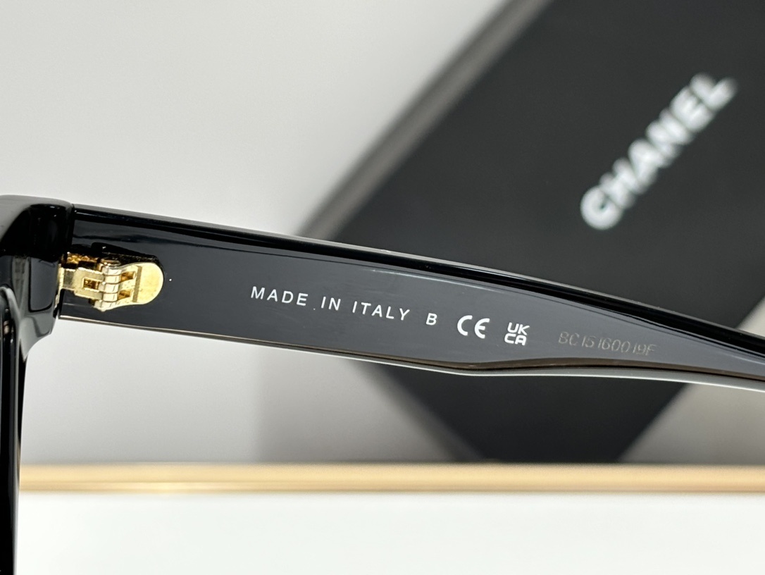 Chanel Black Cat-Eye Sunglasses with Gold CC Logo Temples