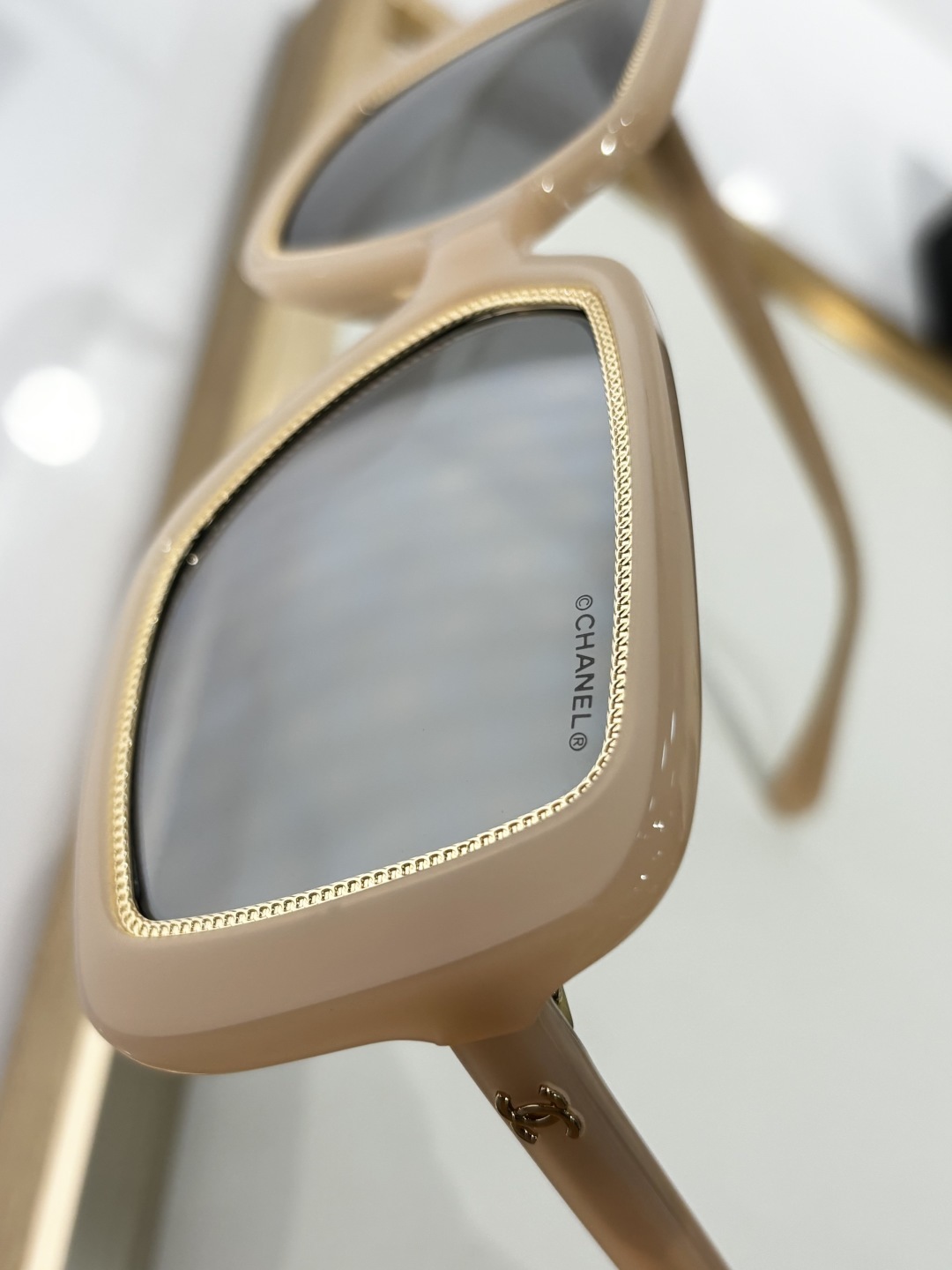 Chanel OCH71709A Square Sunglasses – Beige with Gold Chain Detail