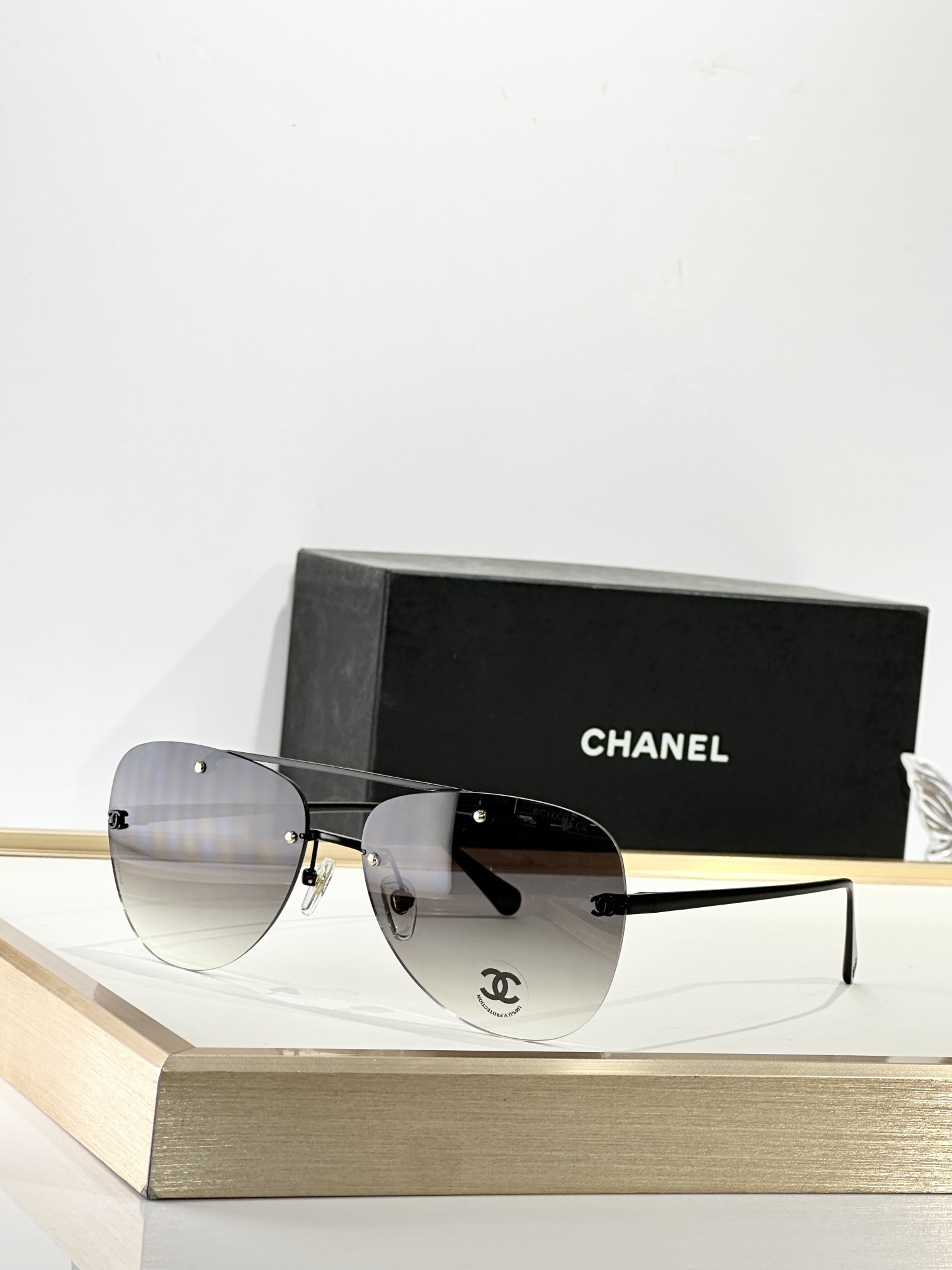 Chanel Luxury Rimless Aviator Eyewear – Designer Gold & Black