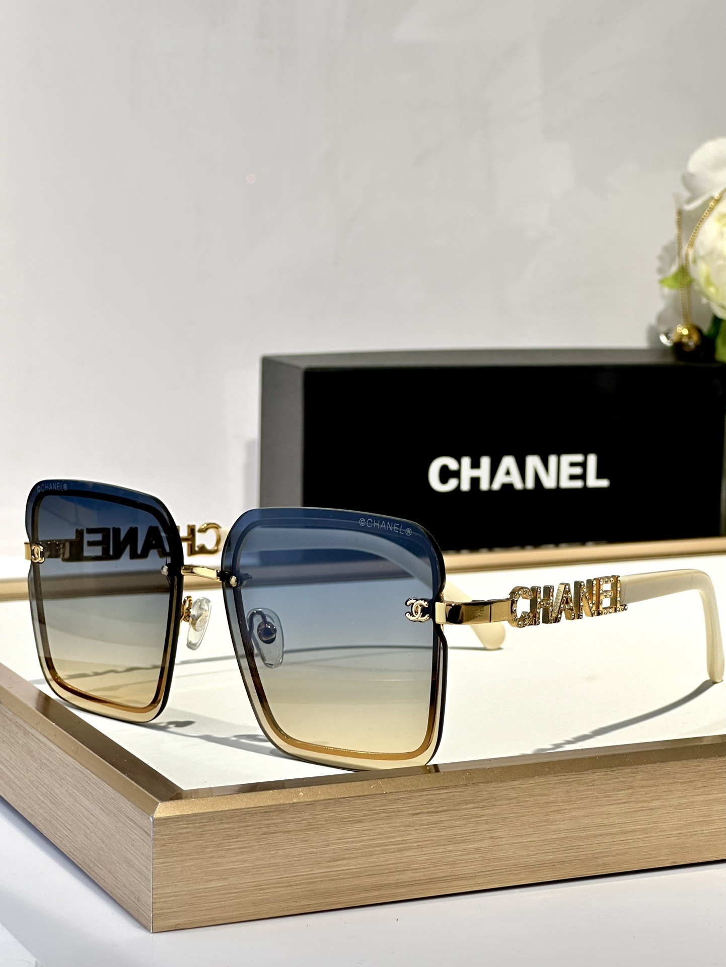 Chanel Luxury Square Rimless Sunglasses with Crystal Logo