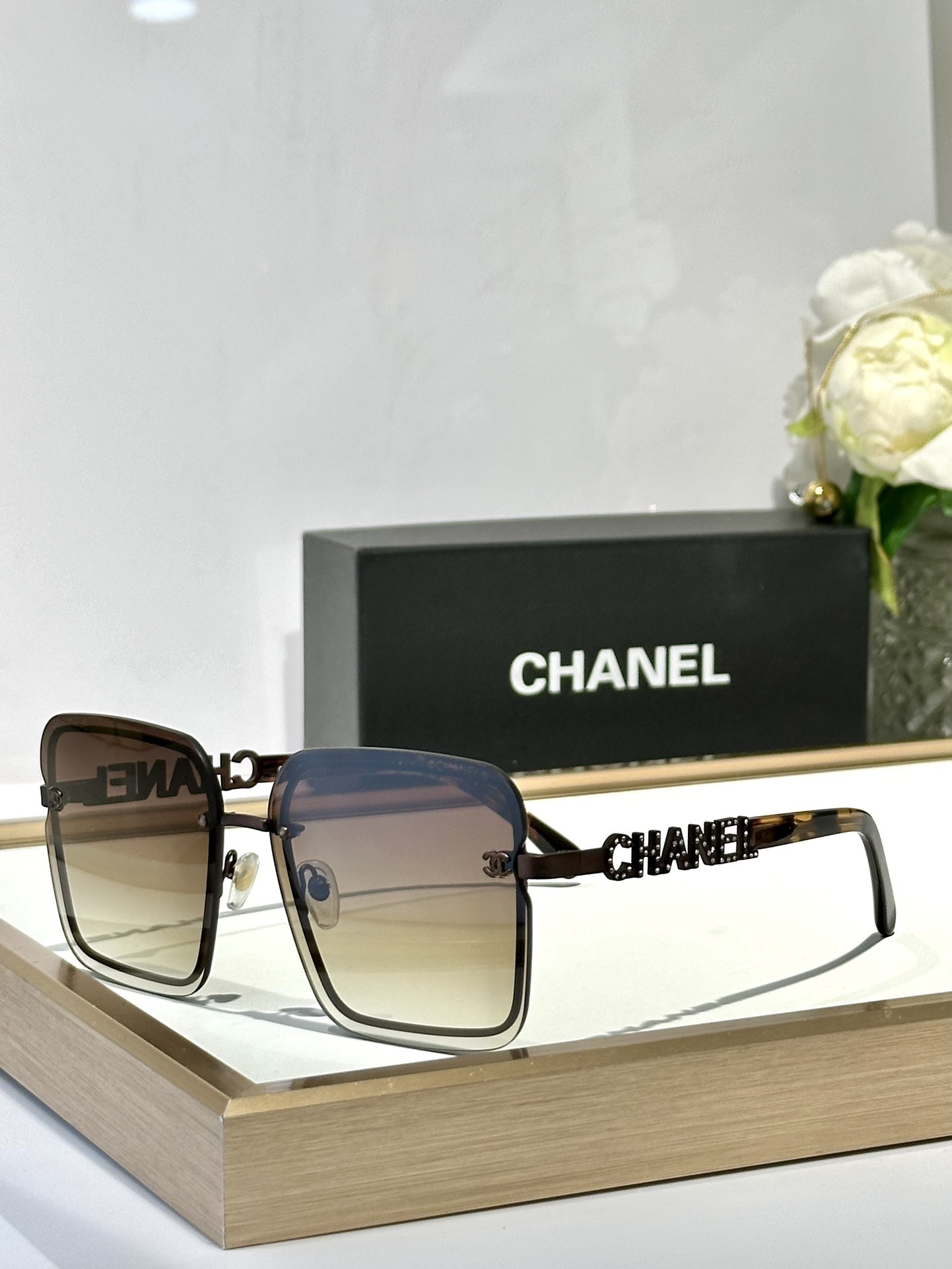 Chanel Luxury Square Rimless Sunglasses with Crystal Logo