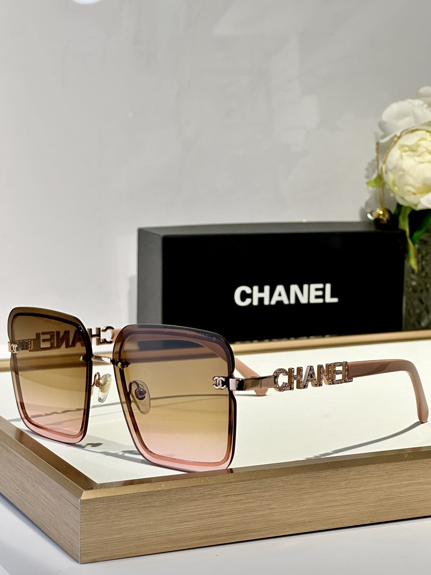 Chanel Luxury Square Rimless Sunglasses with Crystal Logo