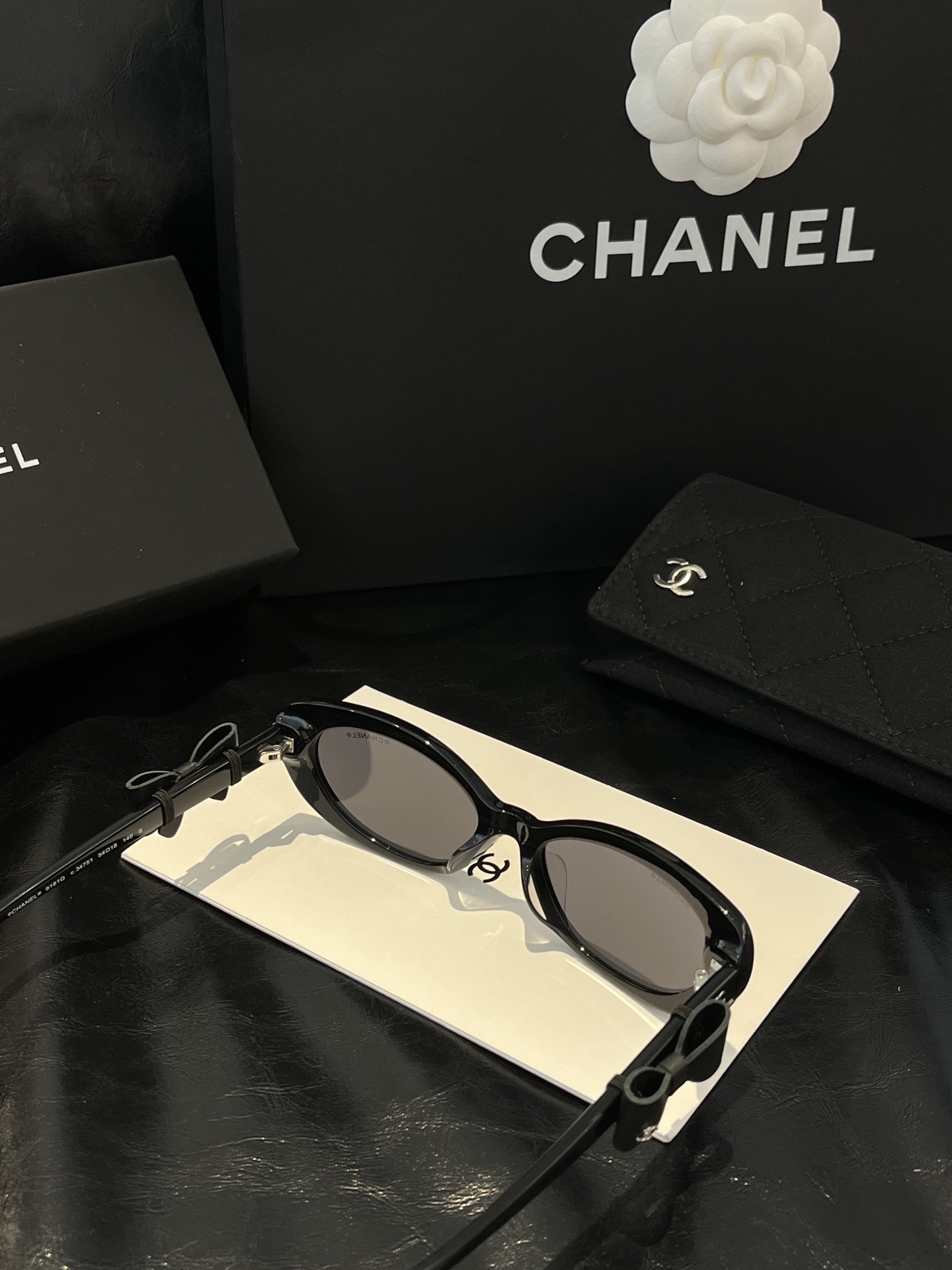 Chanel Black Oval Sunglasses with Bow Detail & CC Logo