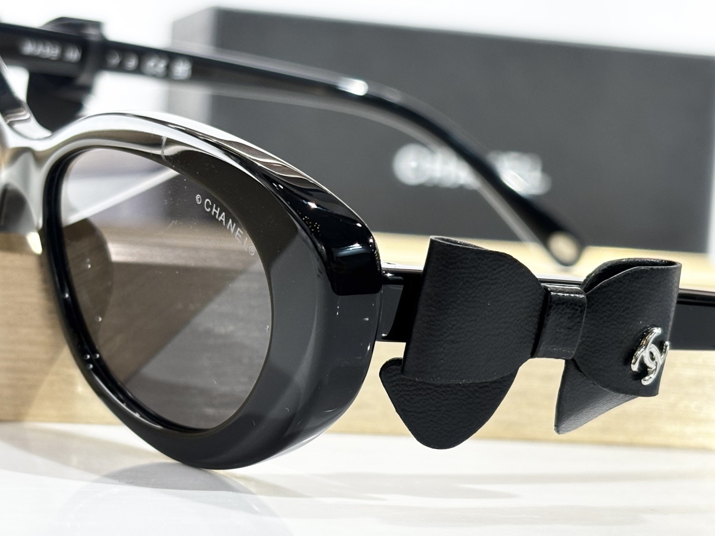 Chanel 9181Q Oval Sunglasses with Leather Bow & CC Logo – Black