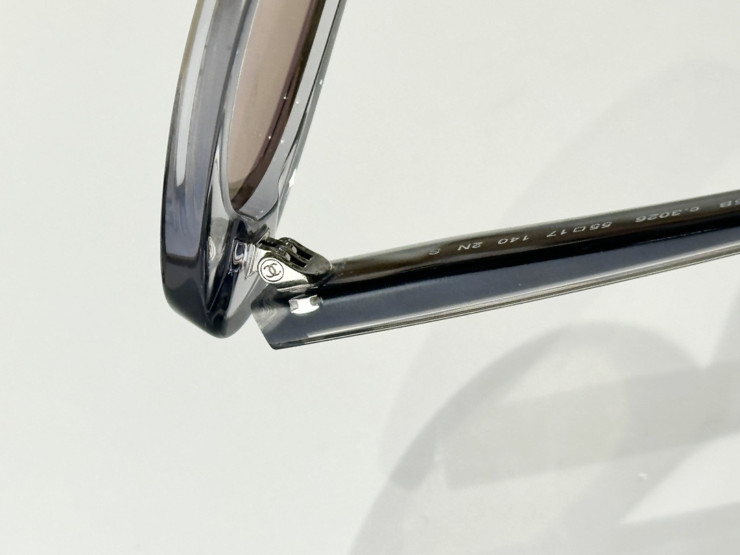 Chanel Oval Sunglasses – Transparent Grey Frame & Gold Mirror Lens