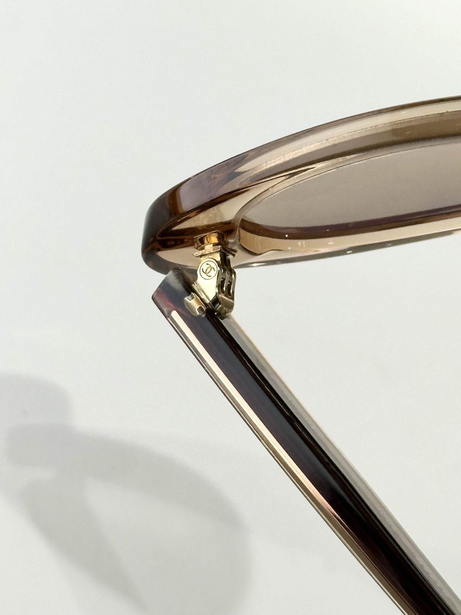 Chanel Oval Sunglasses in Light Orange Acetate with Gold Mirror Lenses