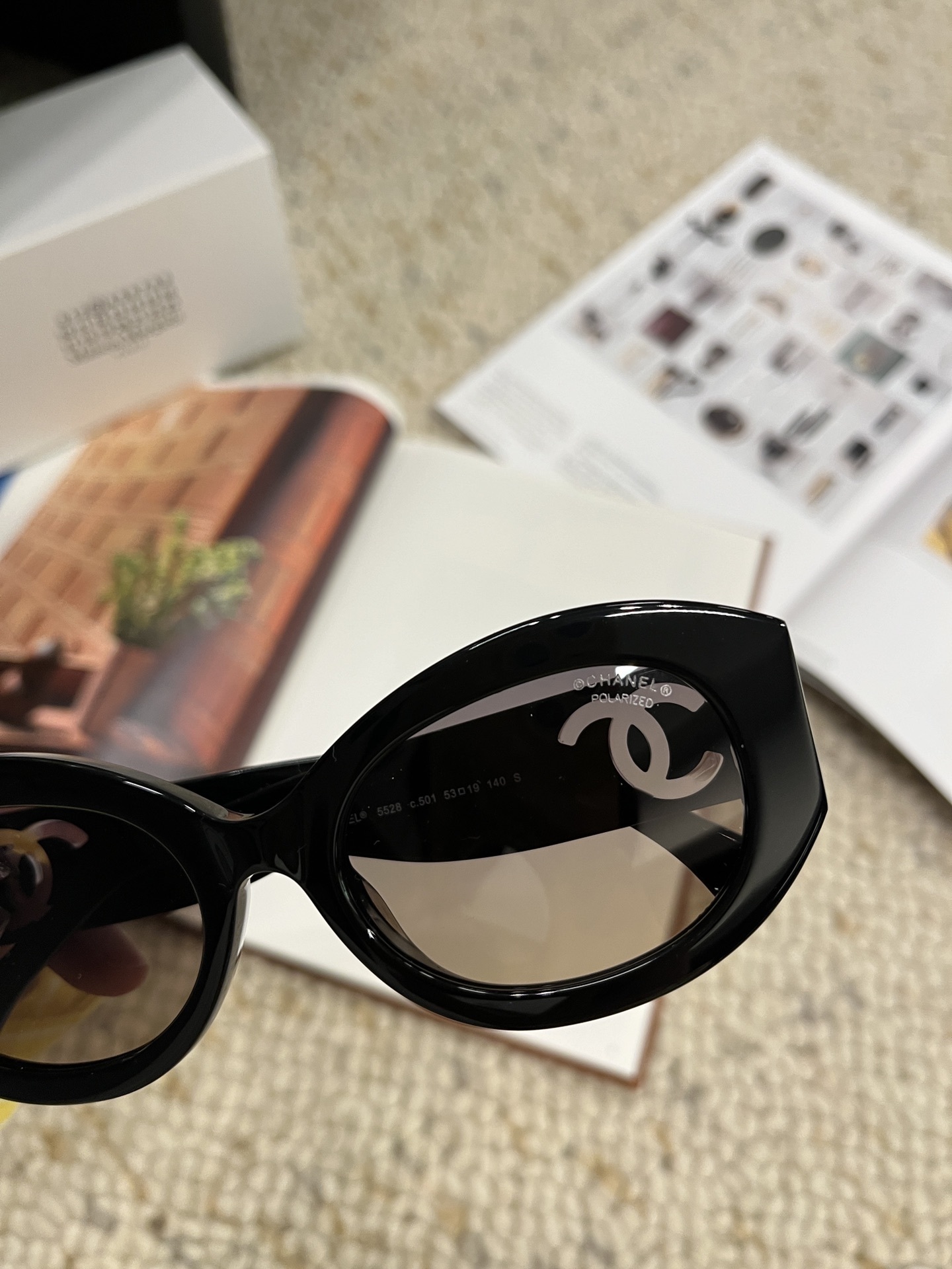 Chanel Black Oval Sunglasses with Signature CC Logo – Luxury Eyewear