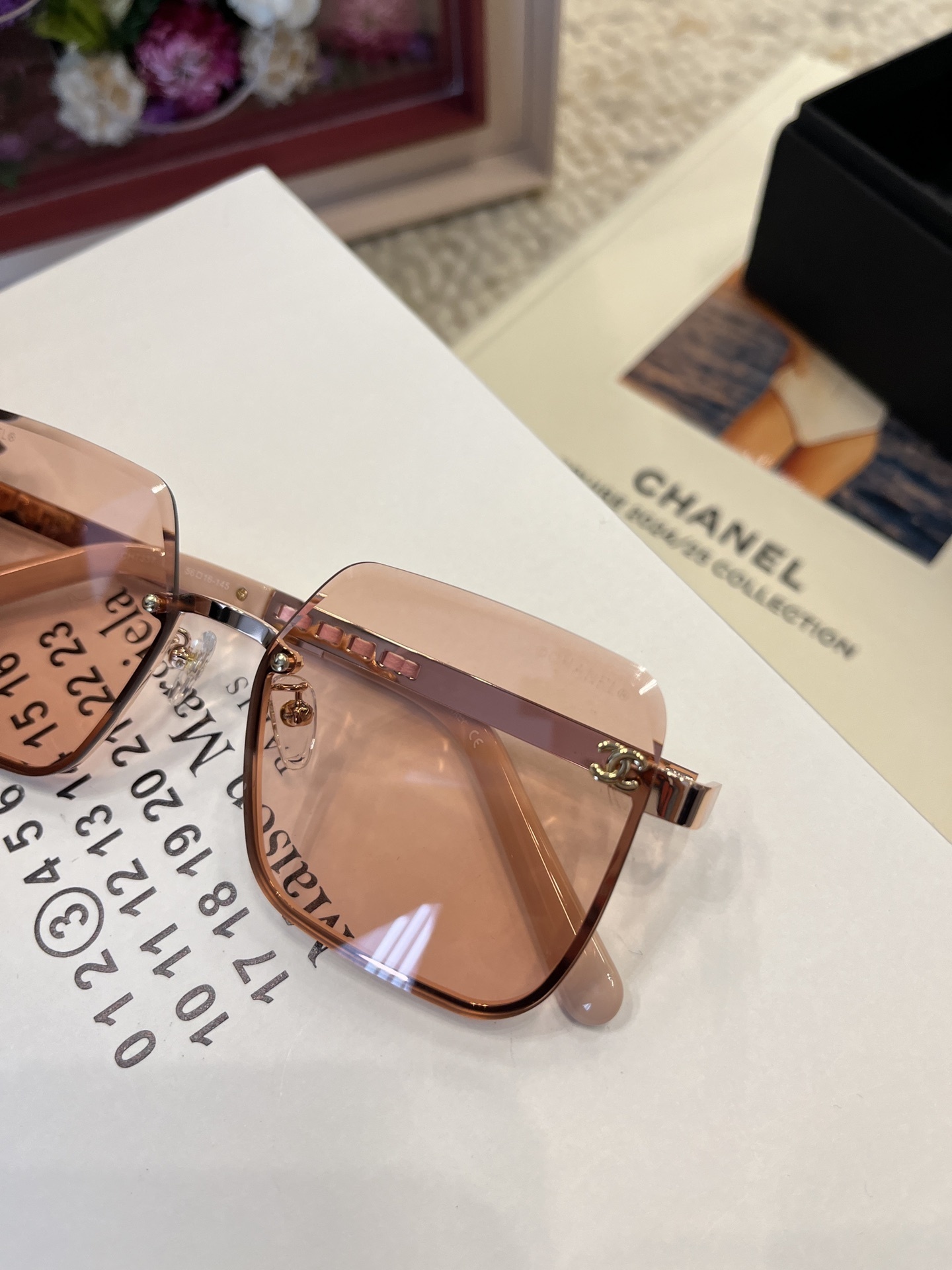 Chanel Square Rimless Sunglasses – Peach Tint & Gold Chain Detail