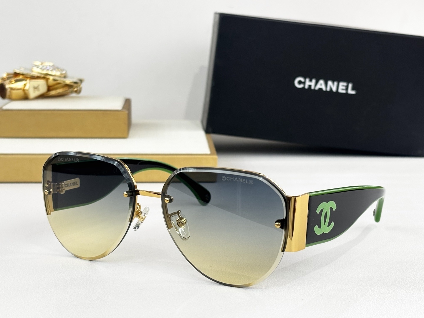 Chanel Luxury Rimless Aviator Sunglasses with CC Logo Temples