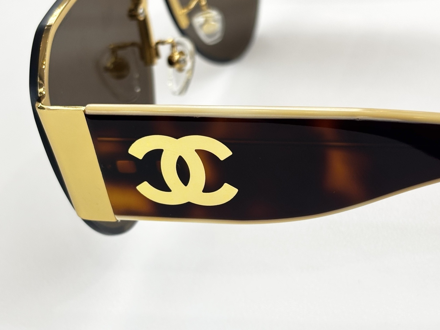 Chanel Luxury Rimless Aviator Sunglasses with CC Logo Temples