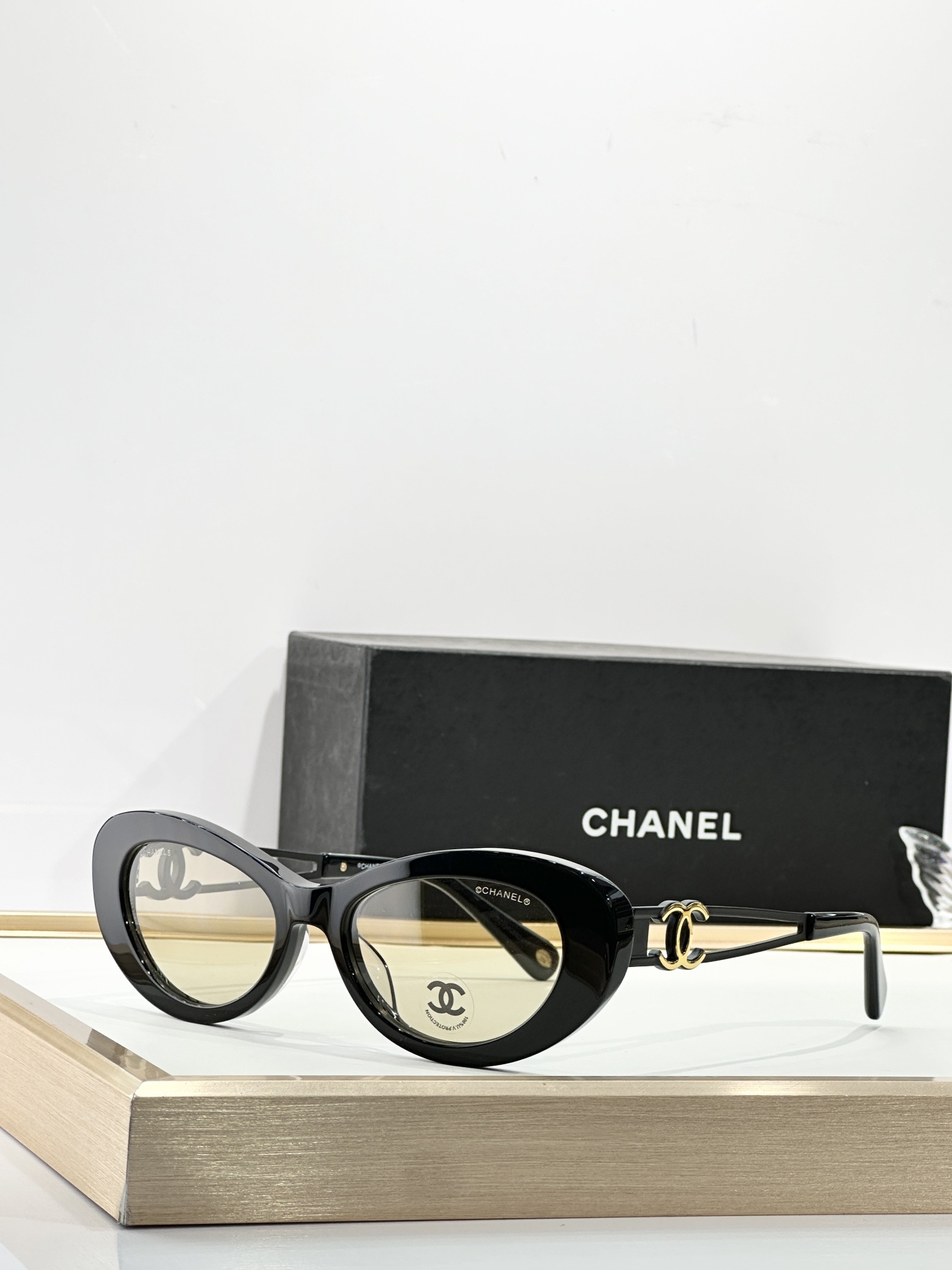 Chanel Luxury Cat-Eye Sunglasses with Gold-Tone CC Logo Temples