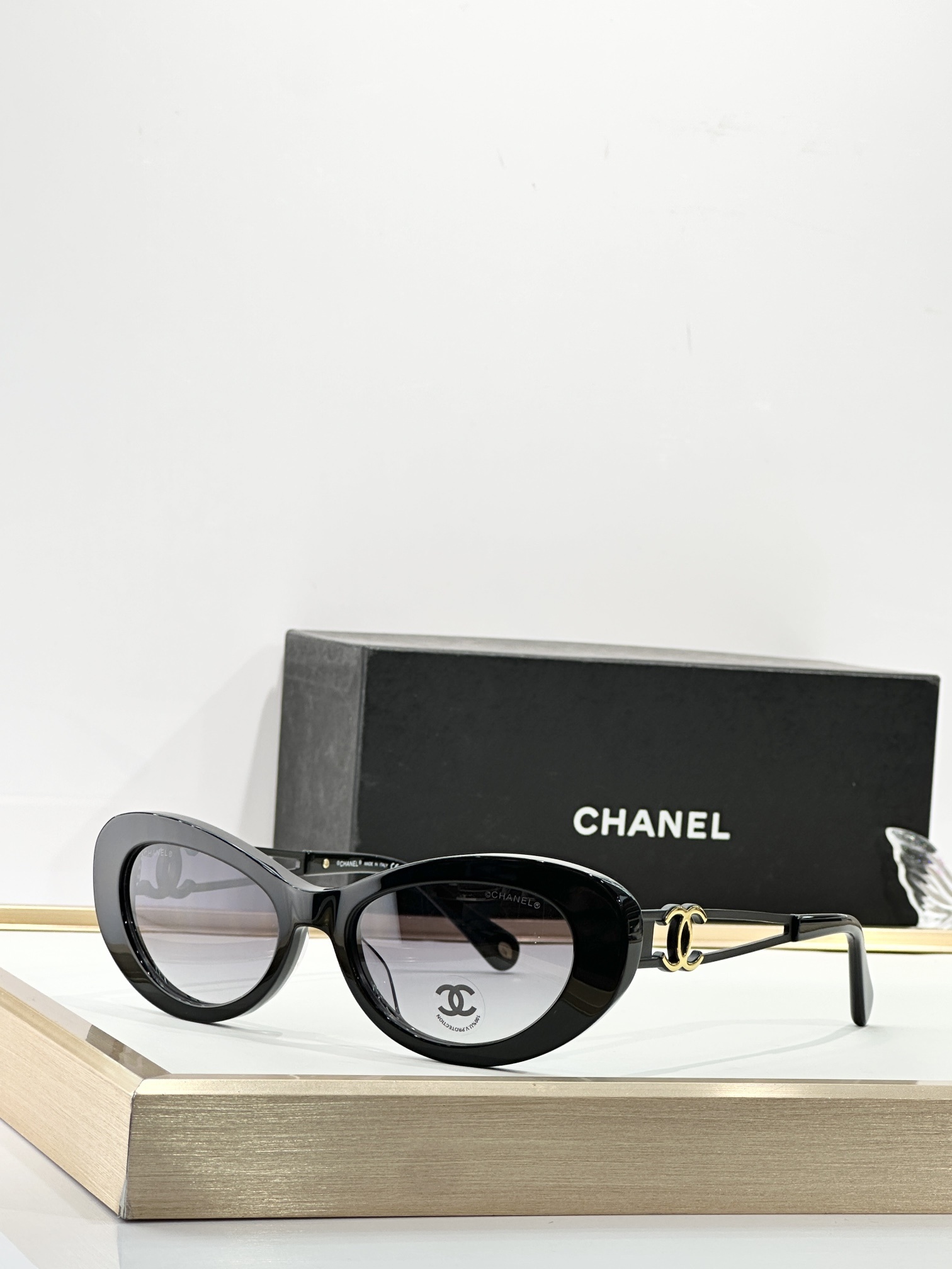 Chanel Luxury Cat-Eye Sunglasses with Gold-Tone CC Logo Temples