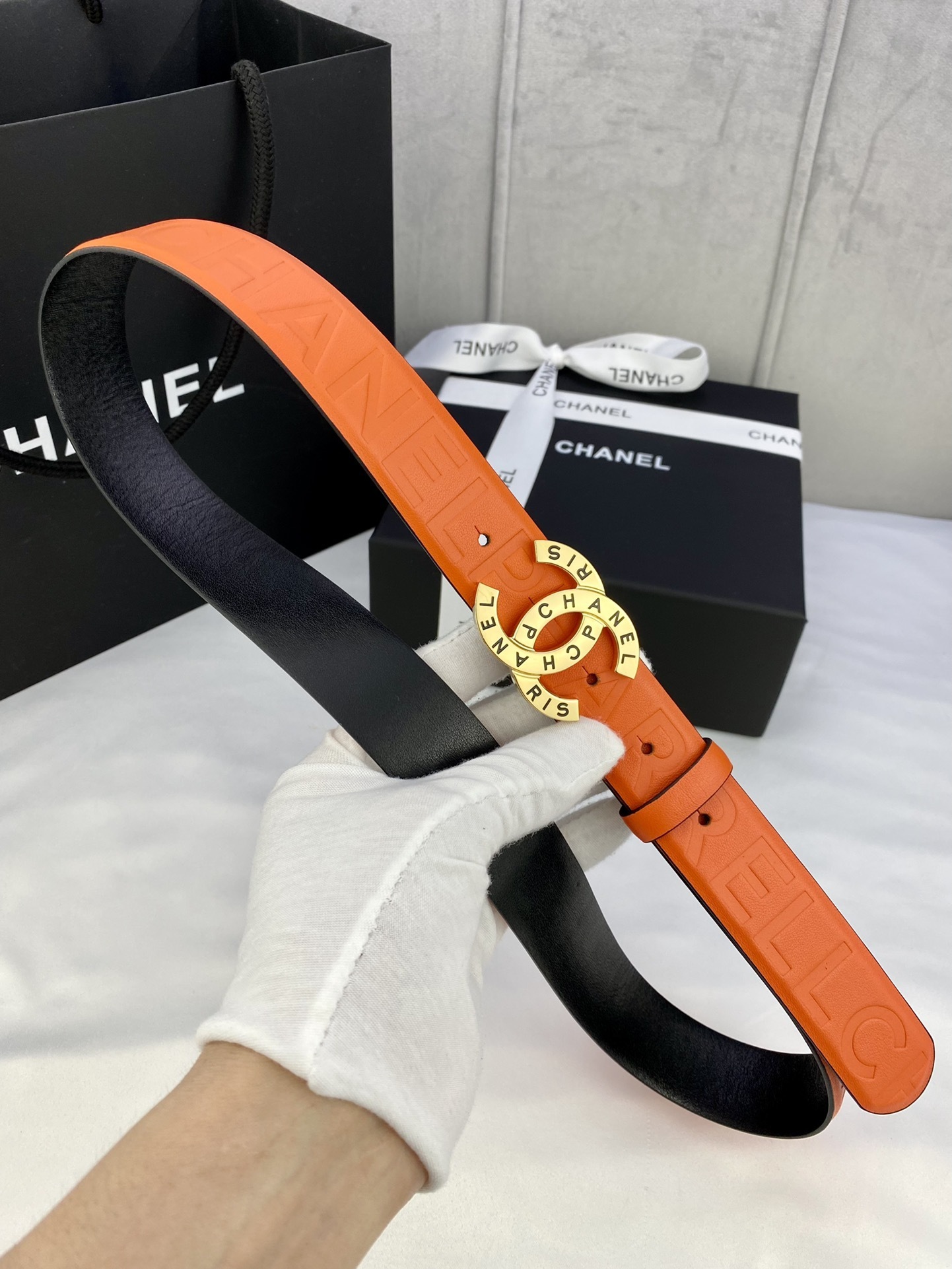 Luxury Orange Leather Belt with Gold Chanel Paris Buckle